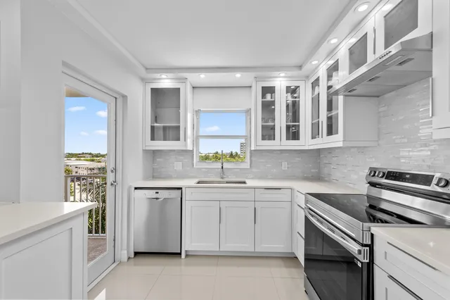 a view of a balcony with furniture