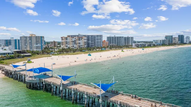 a terrace with water view and city view
