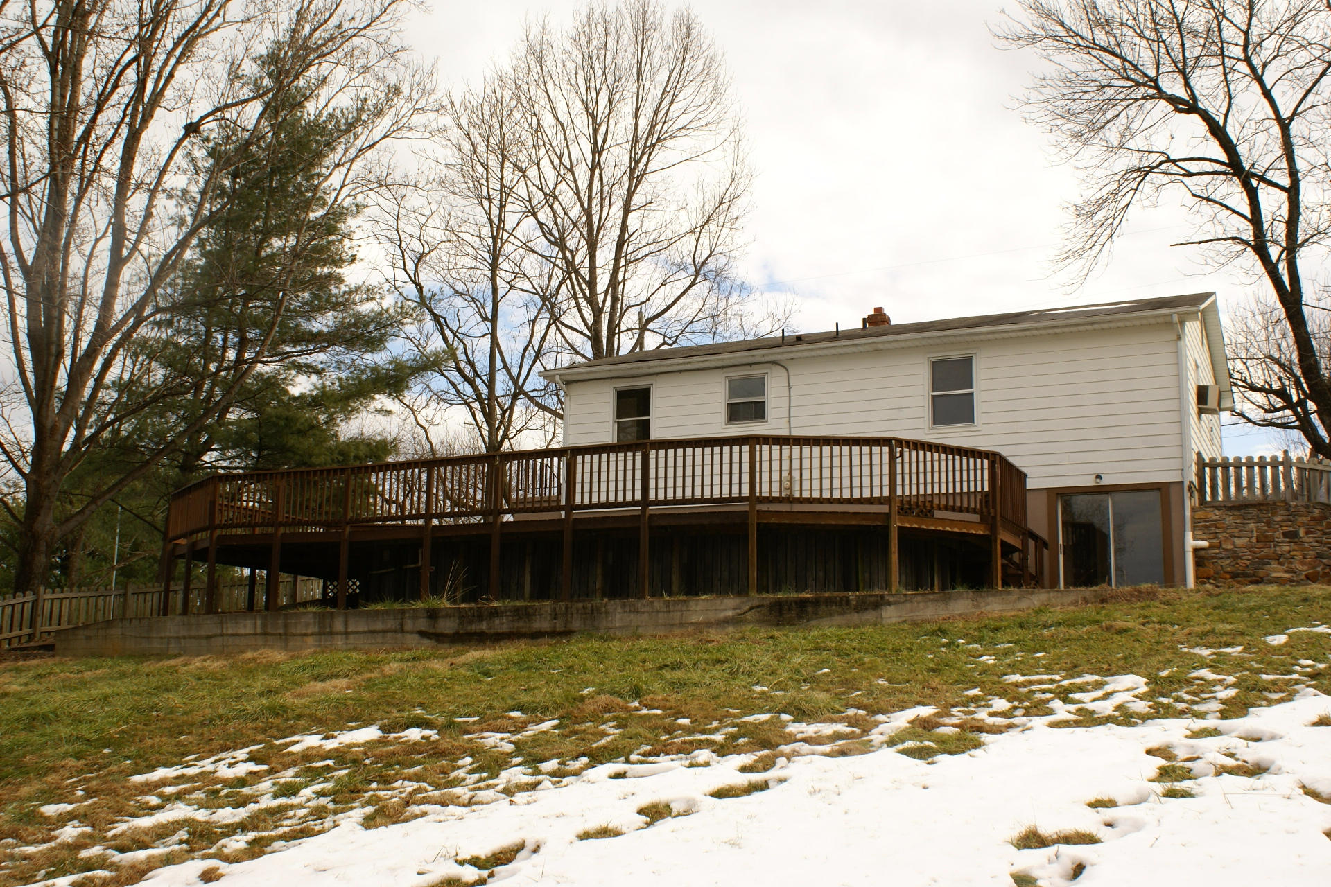 743 Colonial Road Blue Ridge, VA 24064 - Photo 4 of 20 a front view of a house with a large window