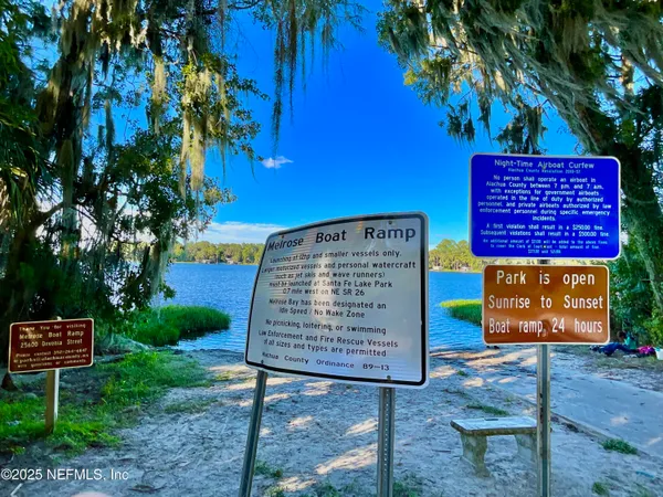 a sign on the side of a road