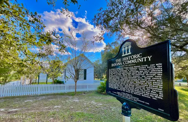a sign on the side of a road