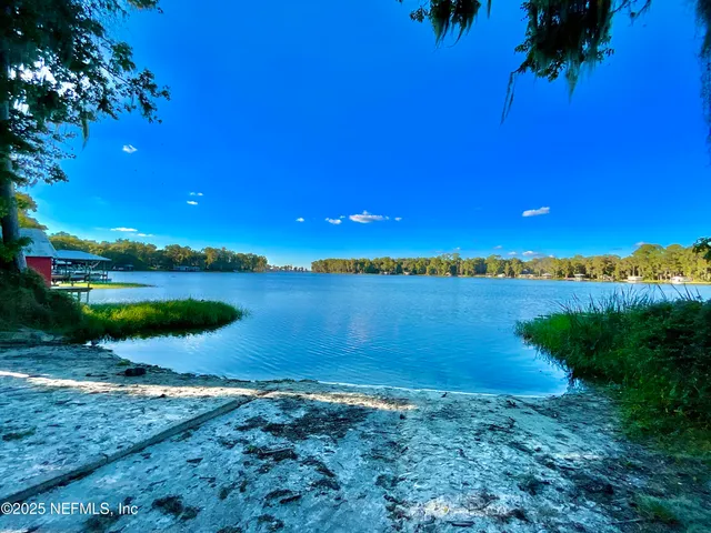 a view of a lake from a yard