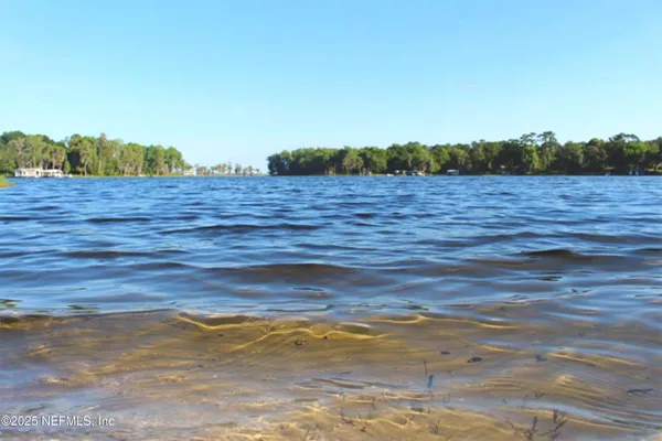 a view of lake view and mountain in the back