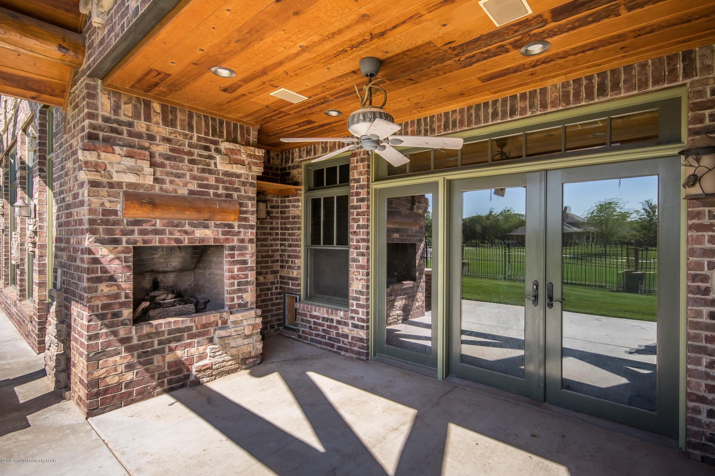 7800 Bayswater Road Amarillo, TX 79119 - Photo 29 of 34 Patio Fireplace