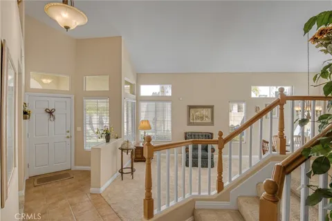 a view of a hallway with an entryway
