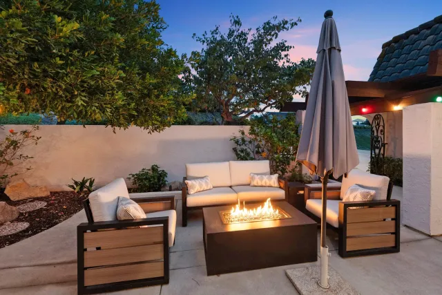 an outdoor sitting area with couch