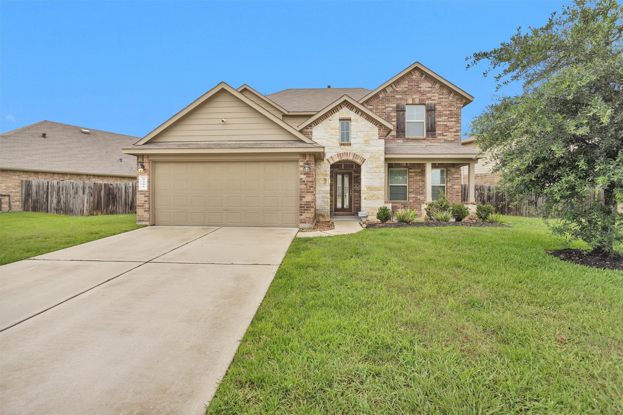 5206 Pointe Spring Crossing Spring, TX 77389 - Photo 3 of 49 Double wide driveway w/ 2 car attached garage.