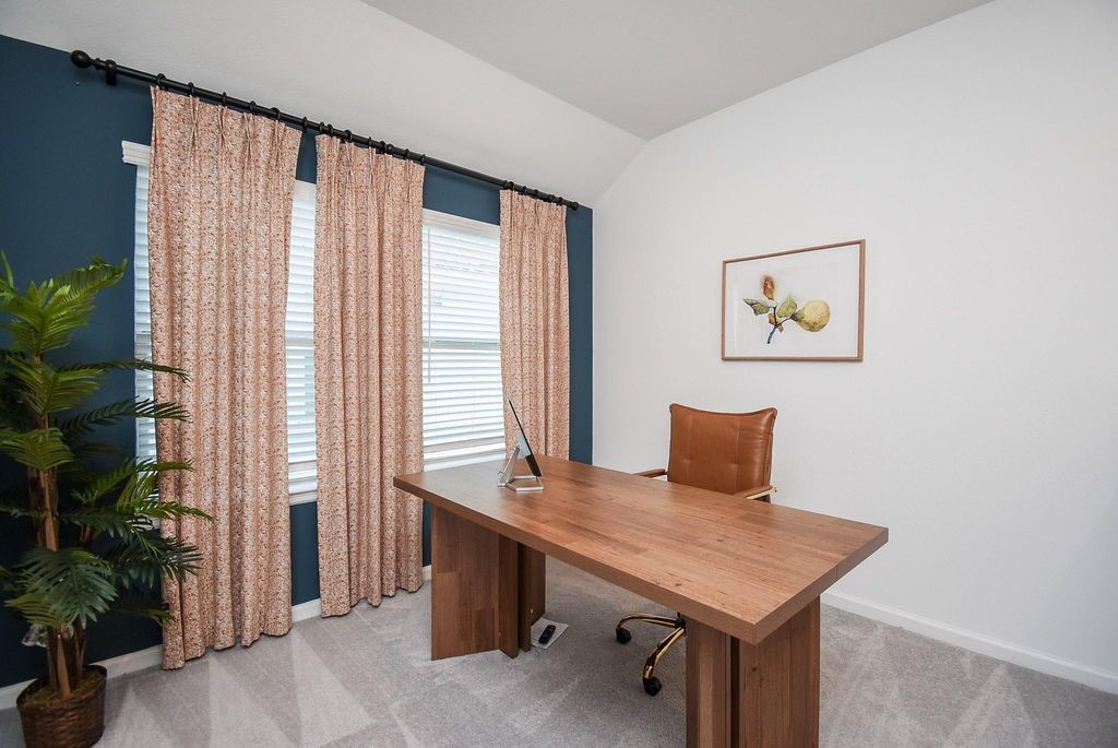 5618 Amber Brook Lane Fulshear, TX 77441 - Photo 10 of 17 a view of a workspace with furniture and a window