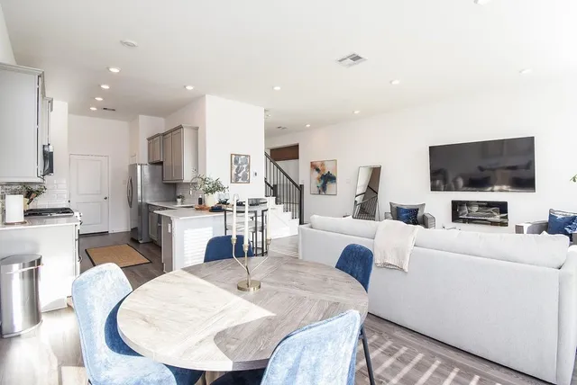 a swimming pool with outdoor seating and yard