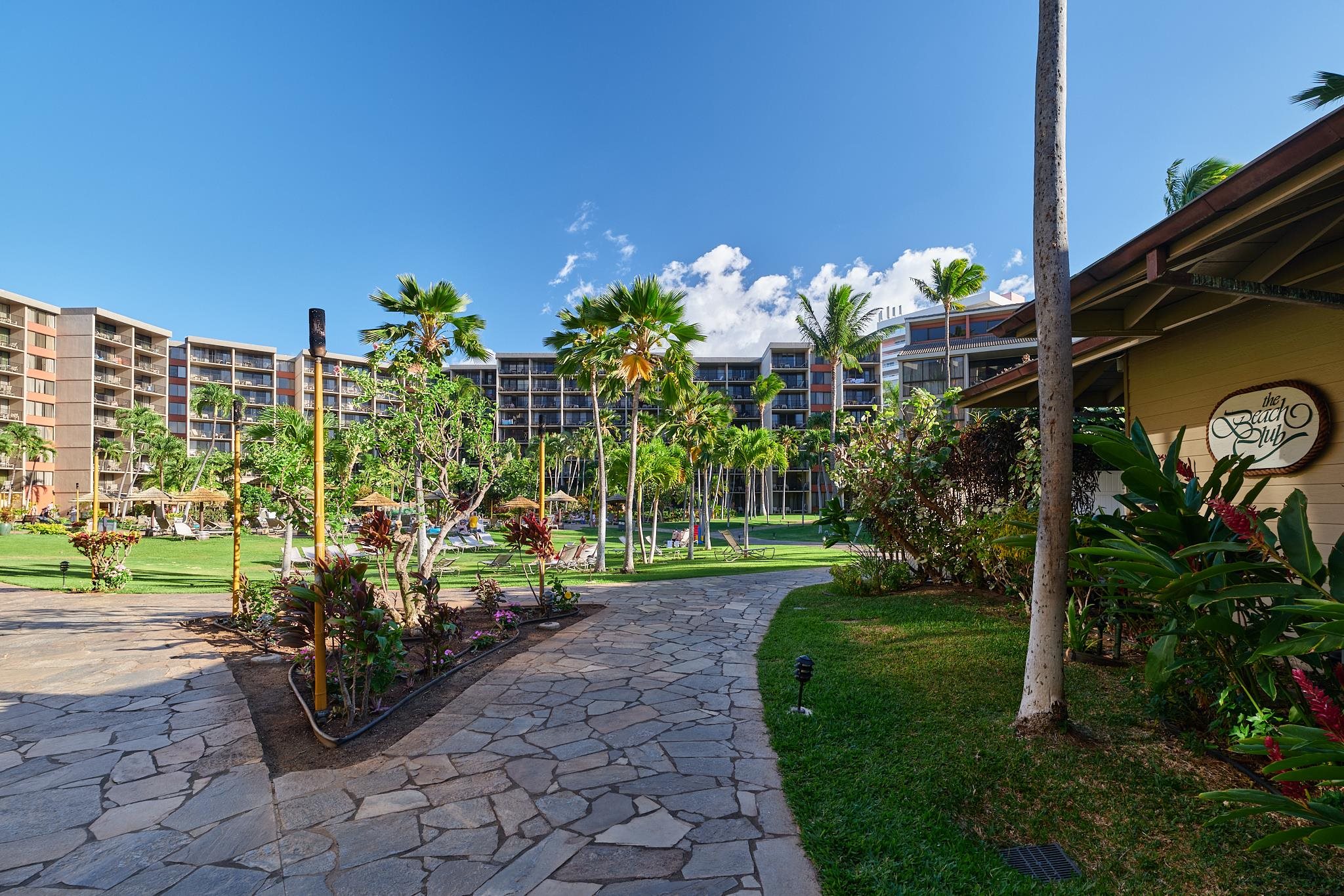 3445 Lower Honoapiilani Road, Unit 212 Lahaina, HI 96761 - Photo 20 of 39 a front view of a house with a yard