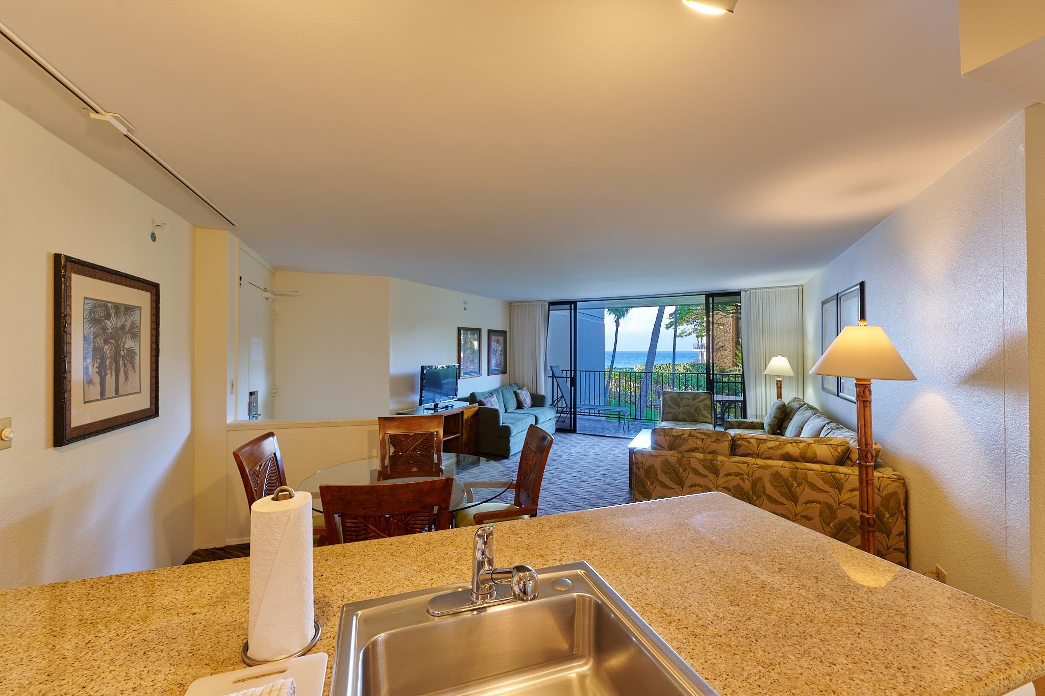 3445 Lower Honoapiilani Road, Unit 212 Lahaina, HI 96761 - Photo 35 of 39 a living room with furniture and a large window