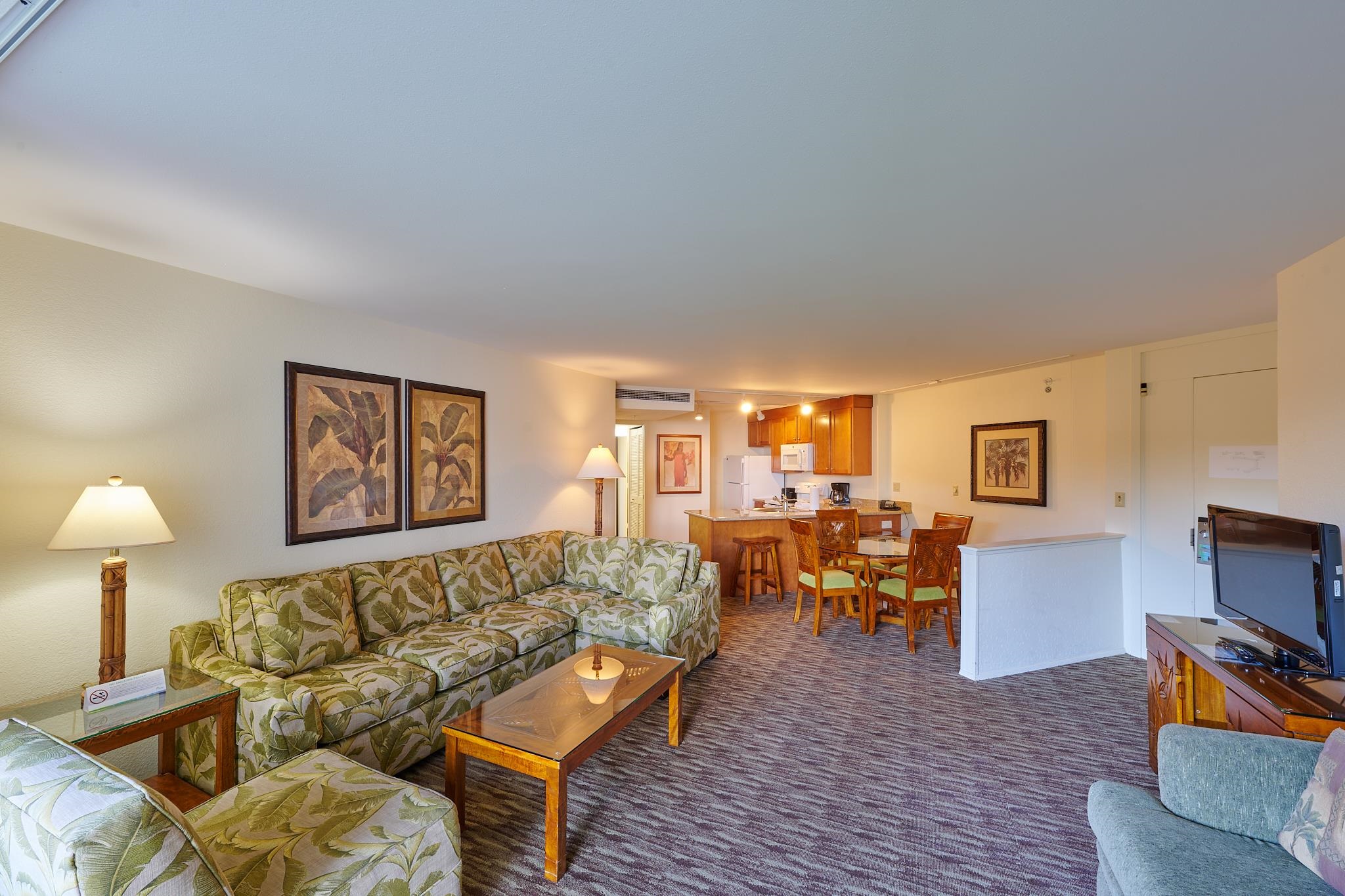 3445 Lower Honoapiilani Road, Unit 212 Lahaina, HI 96761 - Photo 36 of 39 a living room with furniture and wooden floor