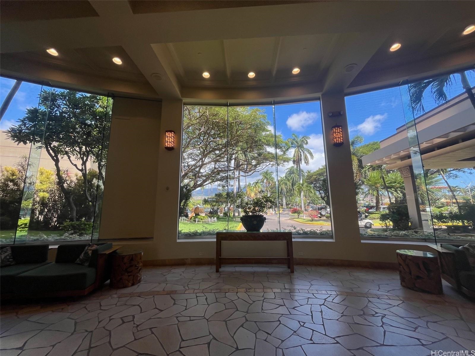 3445 Lower Honoapiilani Road, Unit 212 Lahaina, HI 96761 - Photo 9 of 39 a view of a back yard from a patio