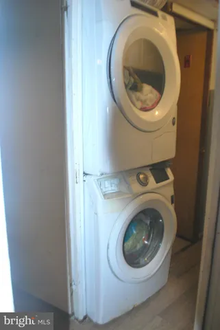 a bathroom with a sink mirror and toilet
