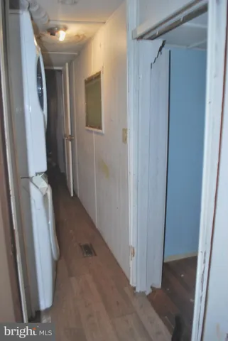 a bedroom with a bed and a table in it