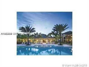 a view of swimming pool outdoor seating and yard