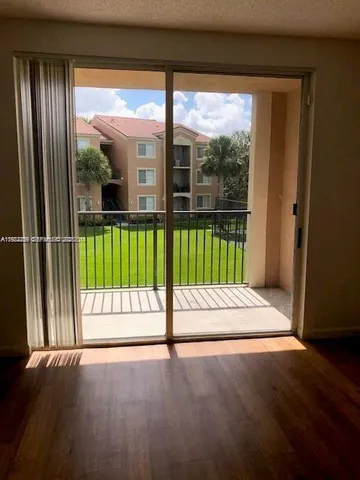 a view of a building from a balcony