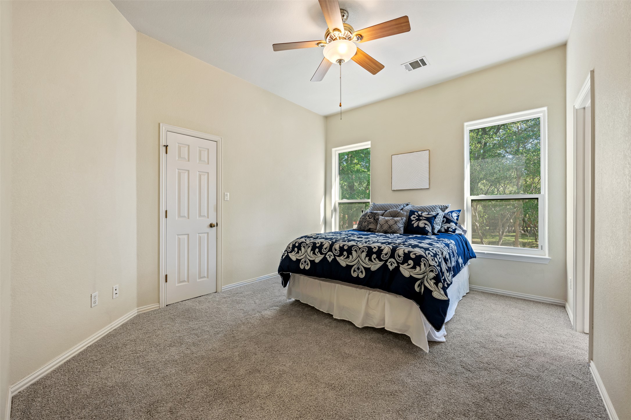 181 Whitney Run Buda, TX 78610 - Photo 25 of 40 Spacious bedroom #2 with walk-in closet.