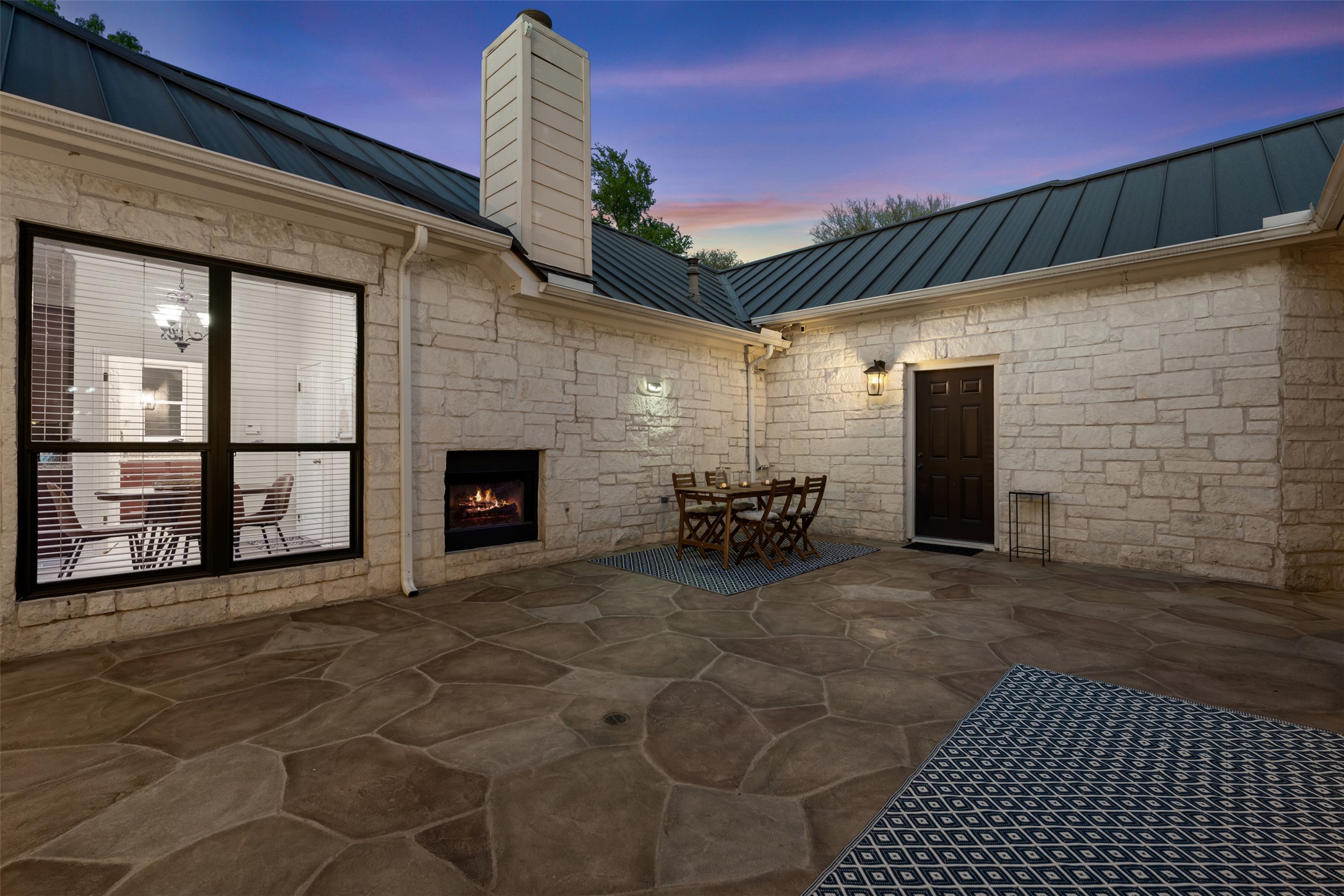181 Whitney Run Buda, TX 78610 - Photo 28 of 40 Door from courtyard leads to a private 4th bedroom/bonus room. There is also access to this room from garage.