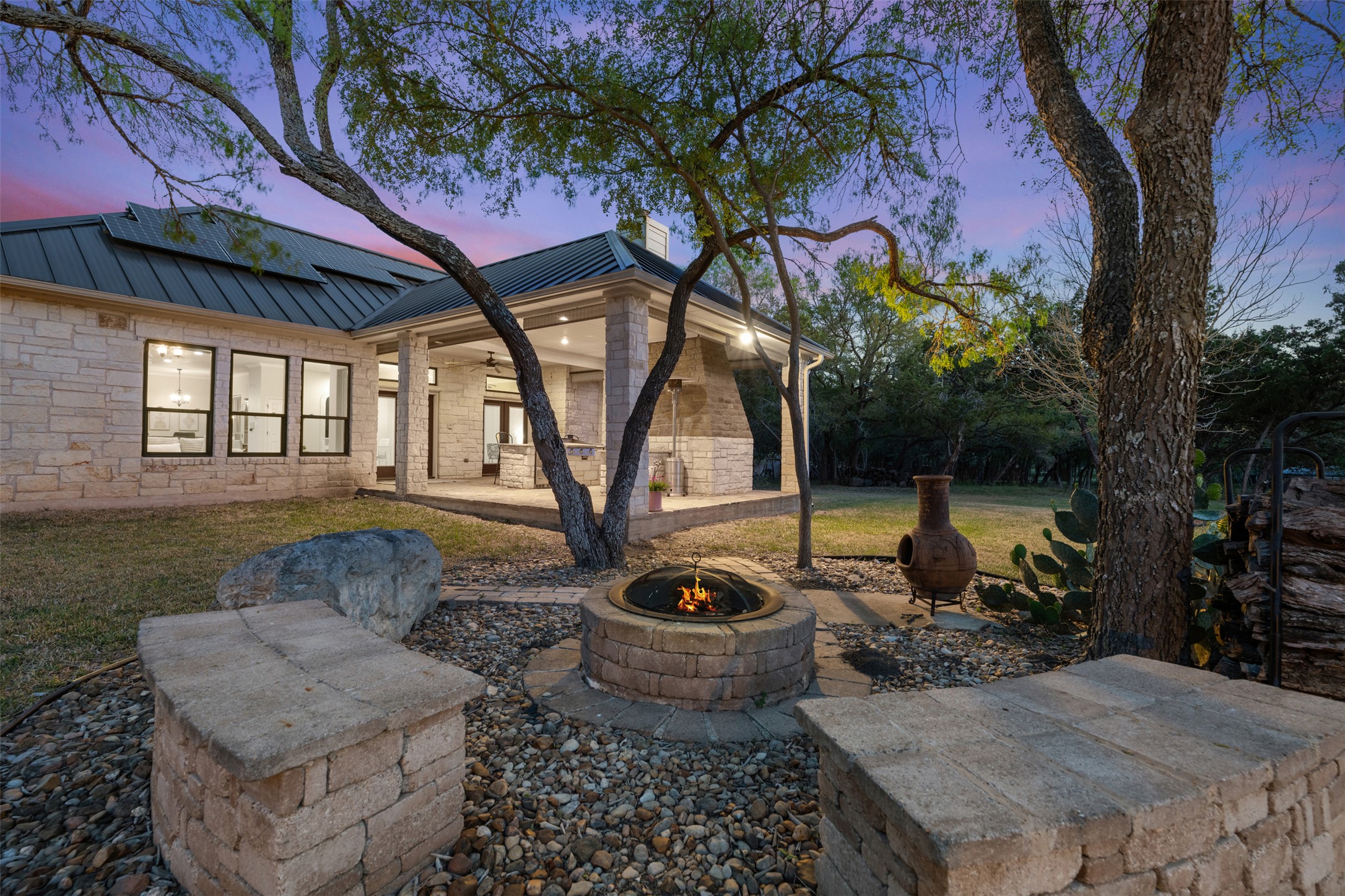 181 Whitney Run Buda, TX 78610 - Photo 36 of 40 Metal roof & solar panels for added energy-efficiency.