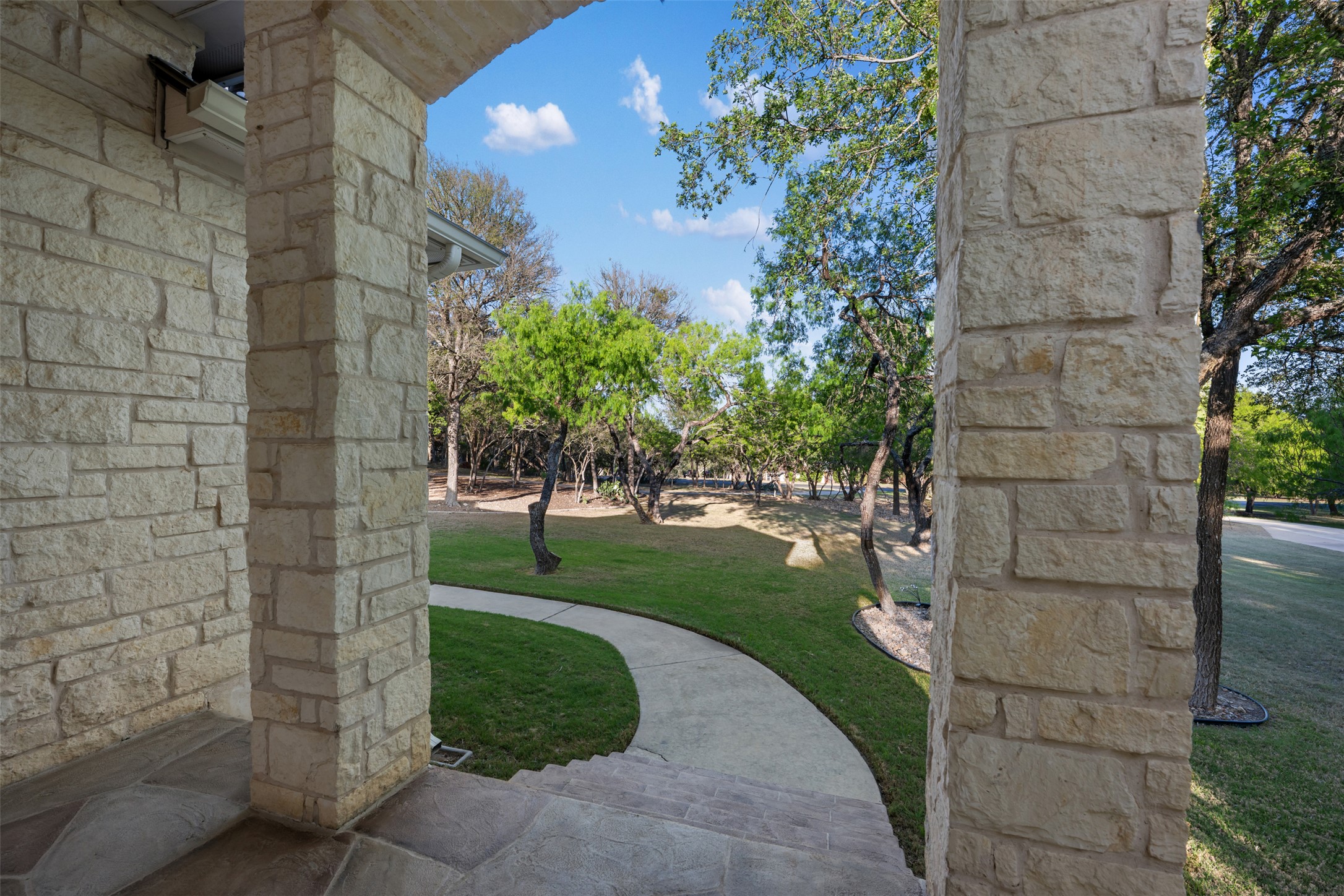 181 Whitney Run Buda, TX 78610 - Photo 7 of 40 Fabulous view from the covered front porch.