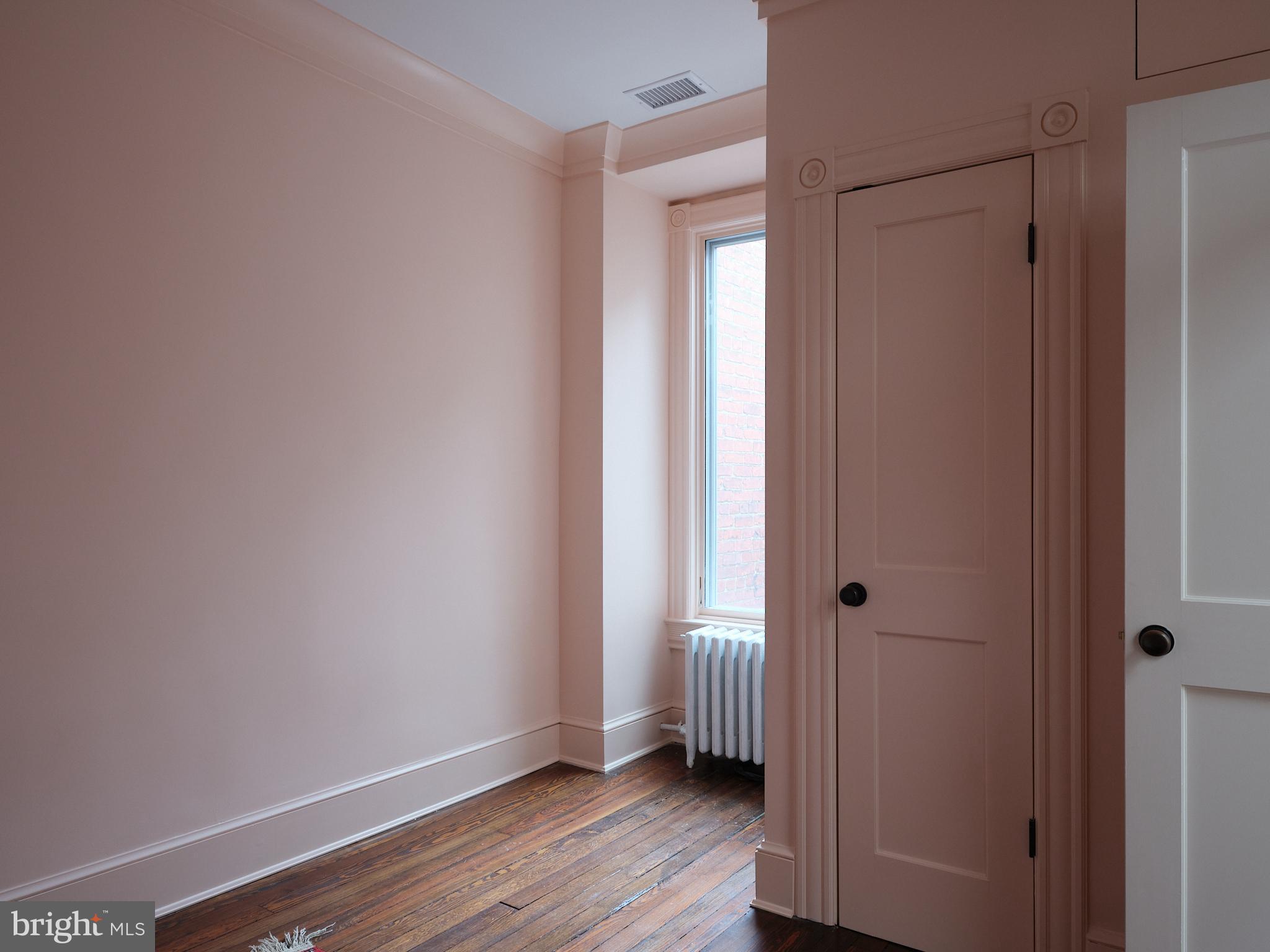 1624 Swann Street Northwest Washington, DC 20009 - Photo 12 of 16 a view of small space with wooden floor
