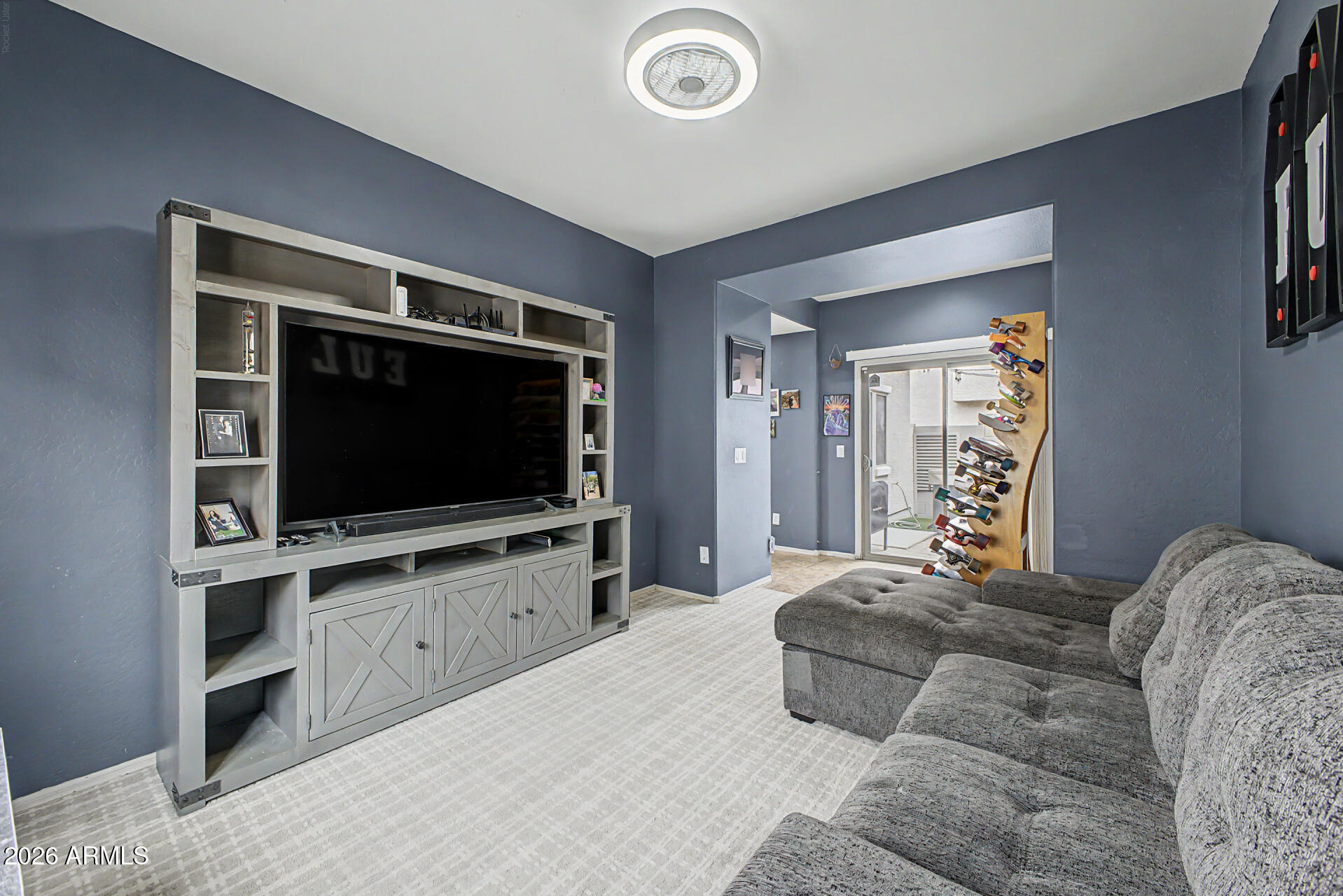435 North Ranger Trail Gilbert, AZ 85234 - Photo 6 of 20 a bedroom with a bed and a flat screen tv