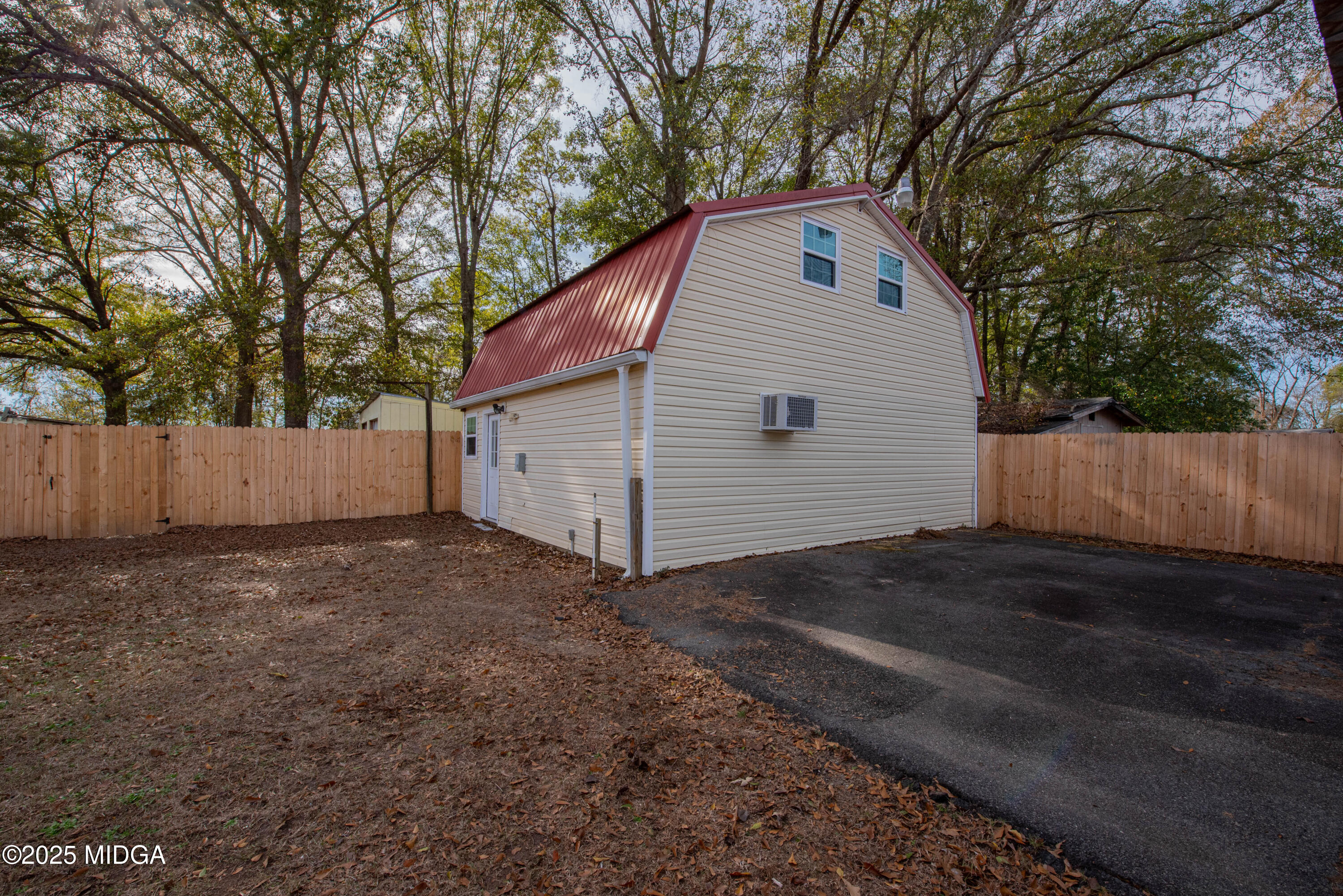 9 Friar Tuck Road Reynolds, GA 31076 - Photo 11 of 48 a view of backyard of house with wooden fence
