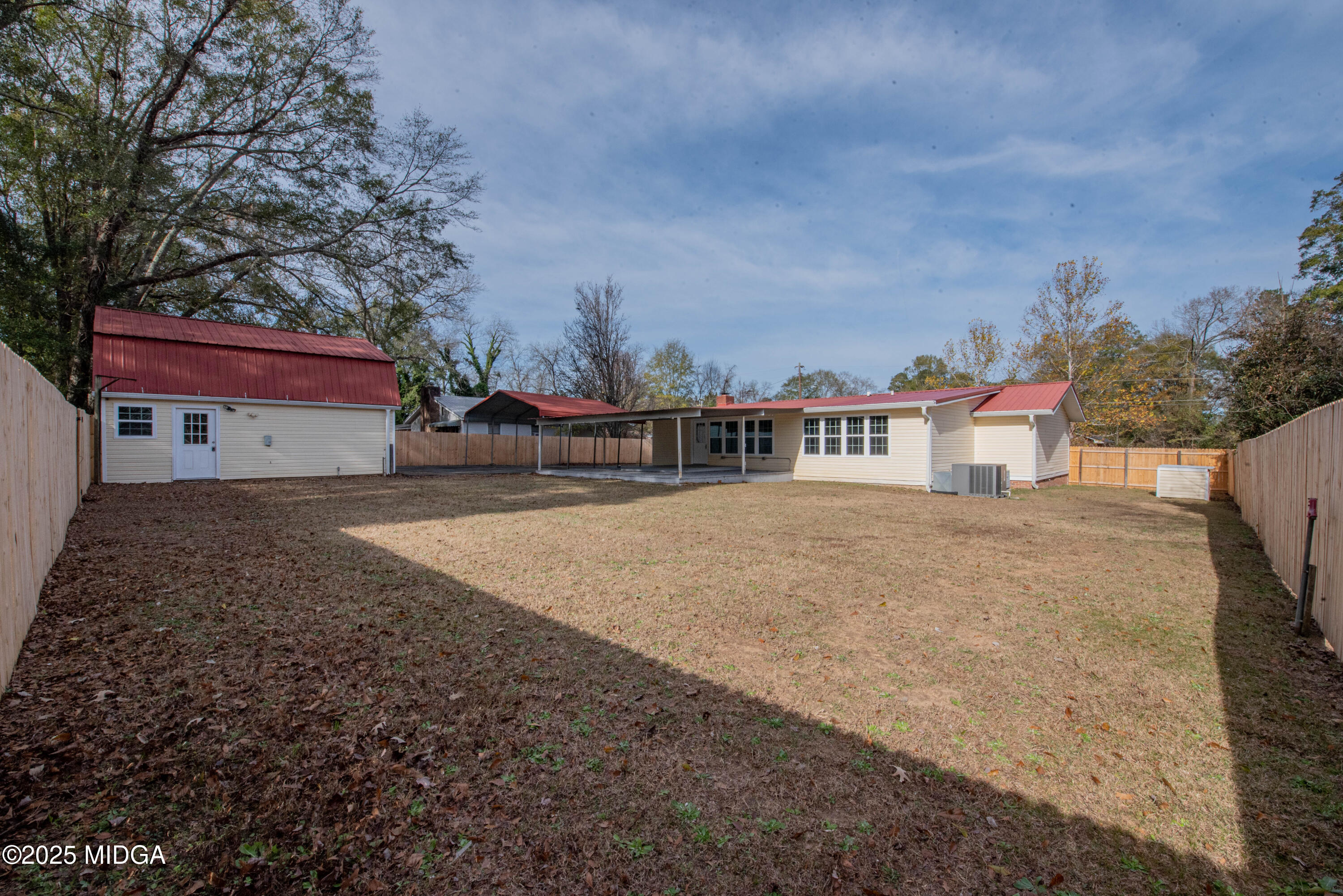 9 Friar Tuck Road Reynolds, GA 31076 - Photo 13 of 48 a view of a house with a yard
