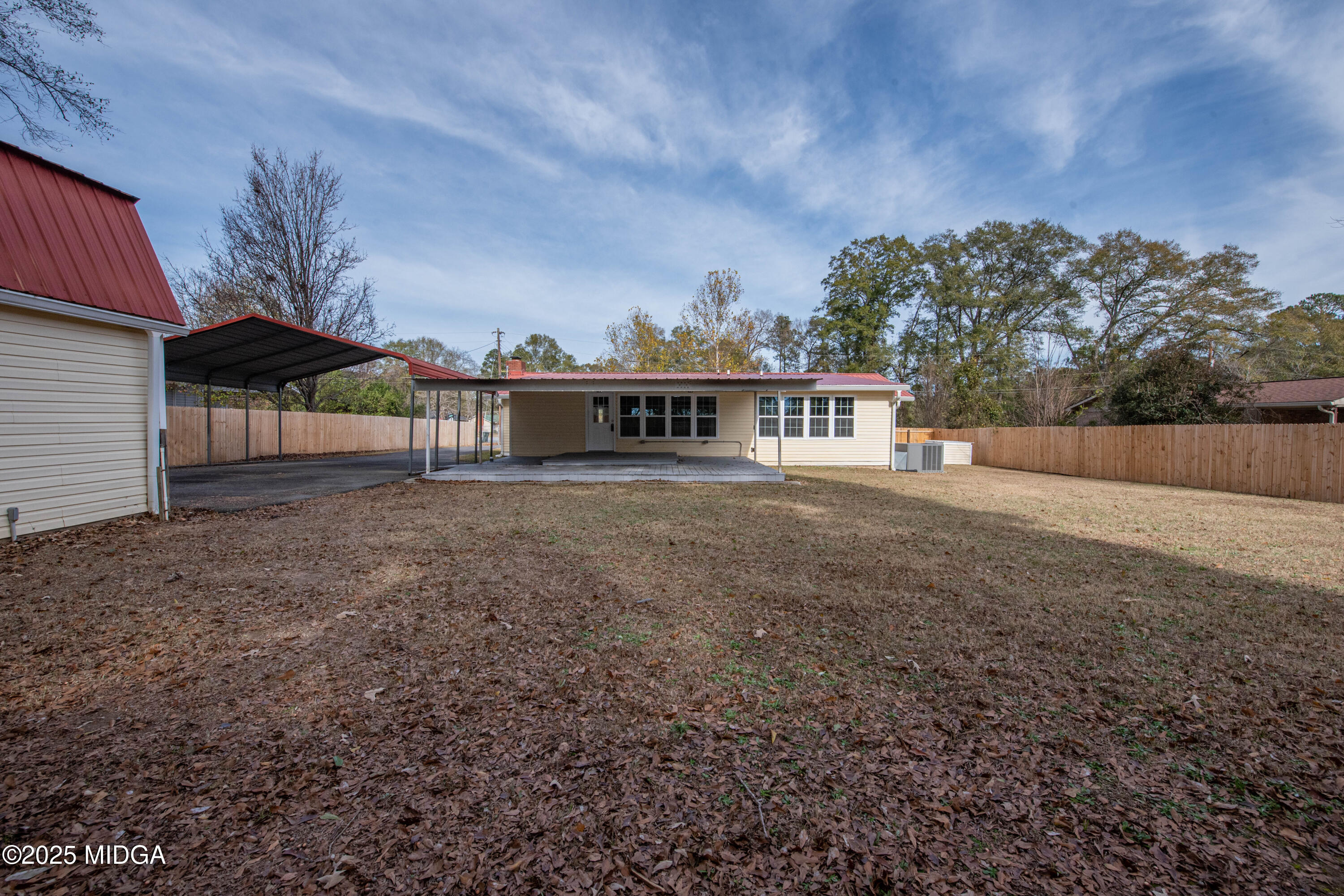 9 Friar Tuck Road Reynolds, GA 31076 - Photo 19 of 48 a view of a house with a yard