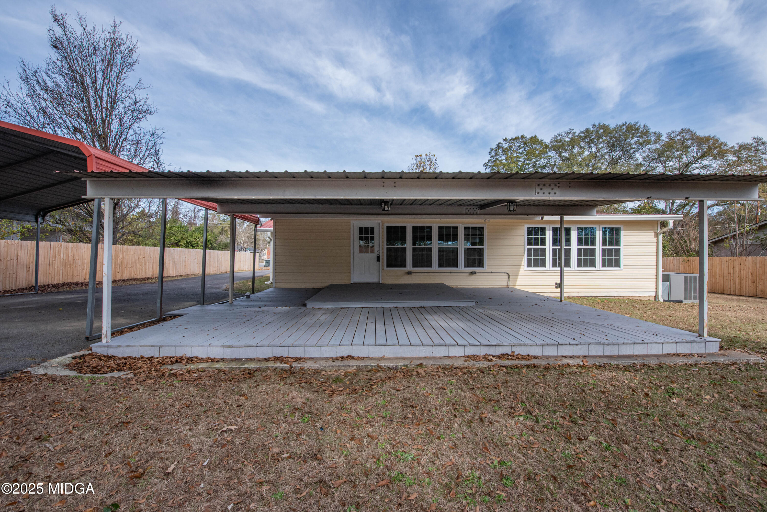 9 Friar Tuck Road Reynolds, GA 31076 - Photo 20 of 48 a front view of a house with a yard