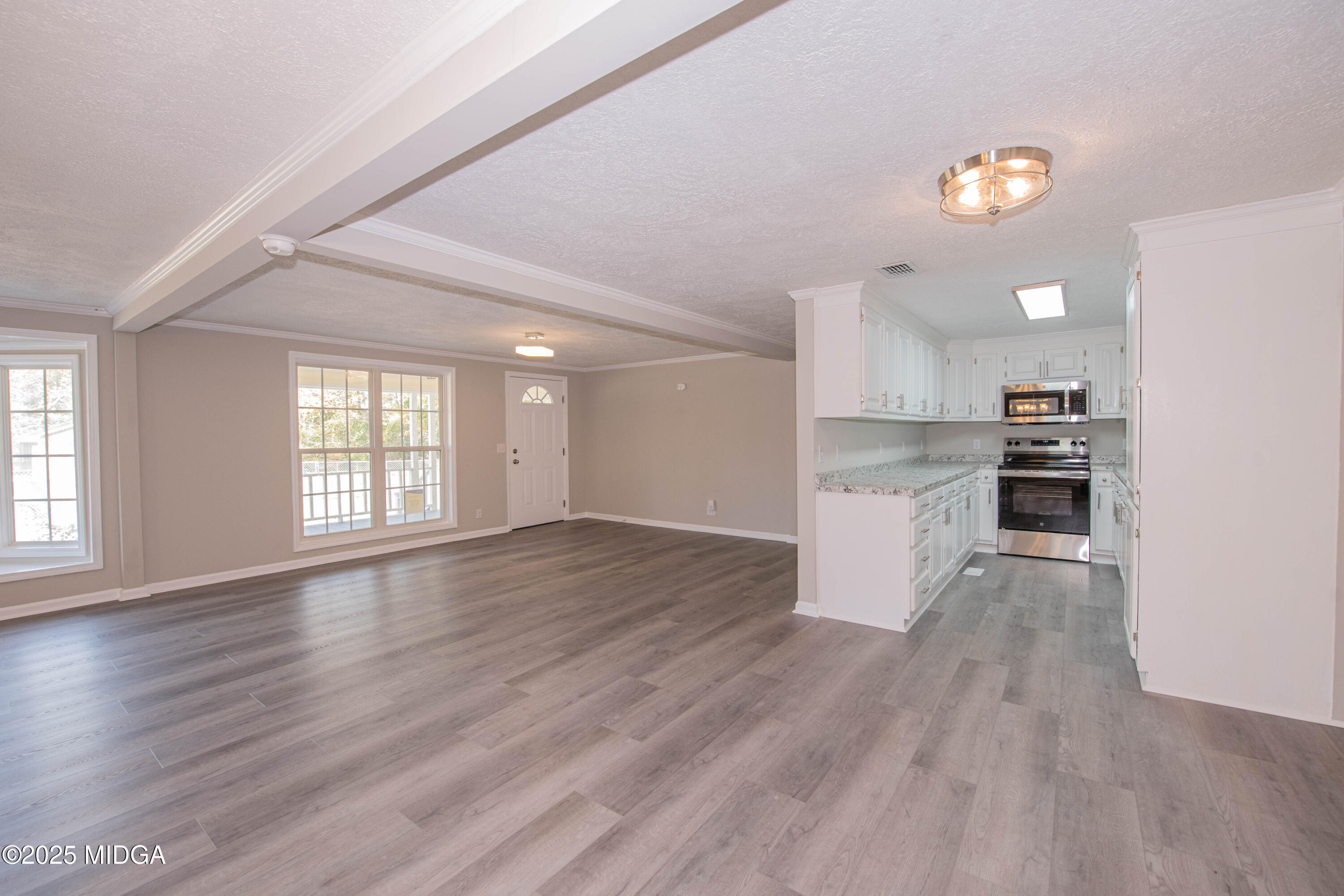 9 Friar Tuck Road Reynolds, GA 31076 - Photo 28 of 48 a view of kitchen and wooden floor