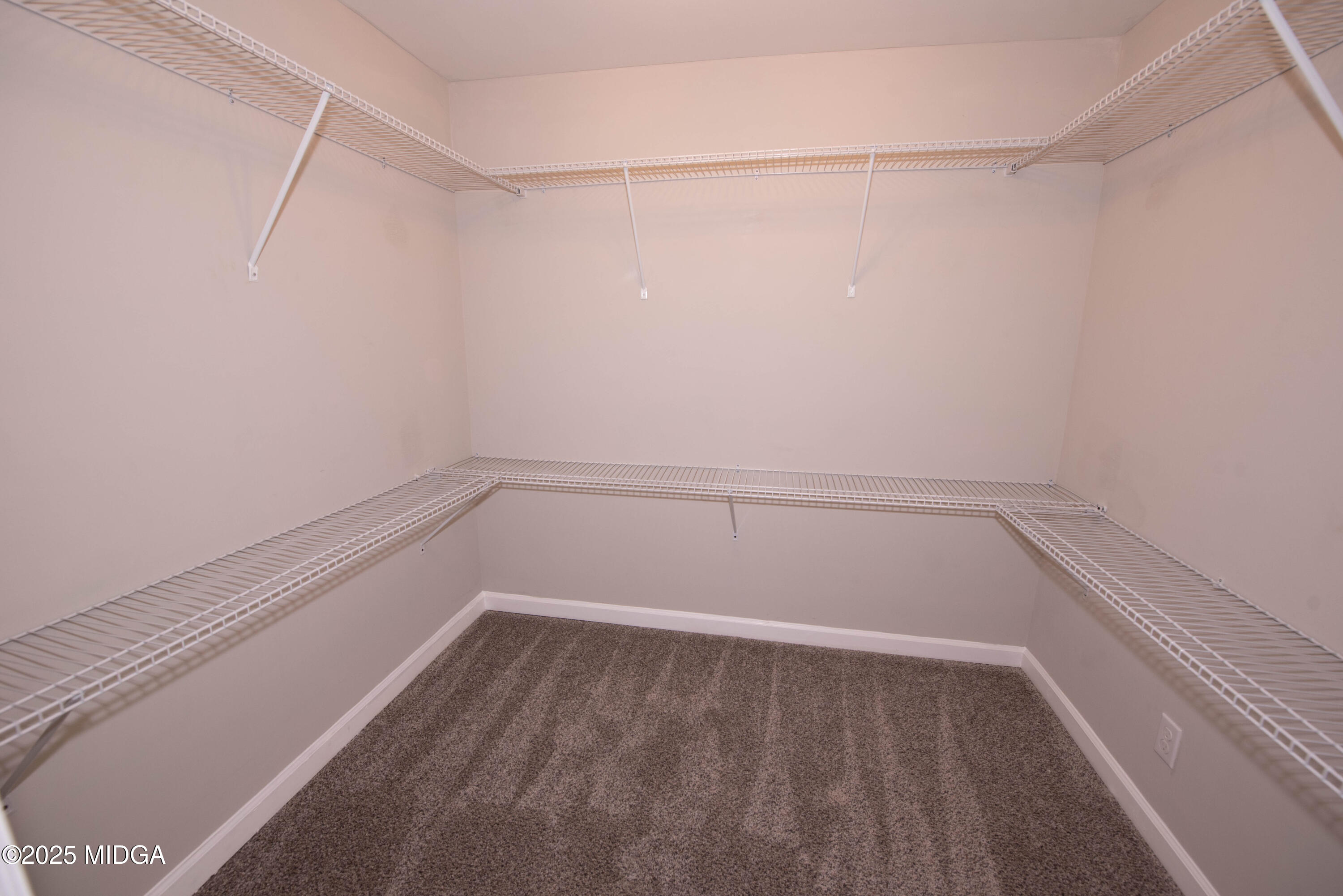 9 Friar Tuck Road Reynolds, GA 31076 - Photo 38 of 48 a view of a room with racks on the wall