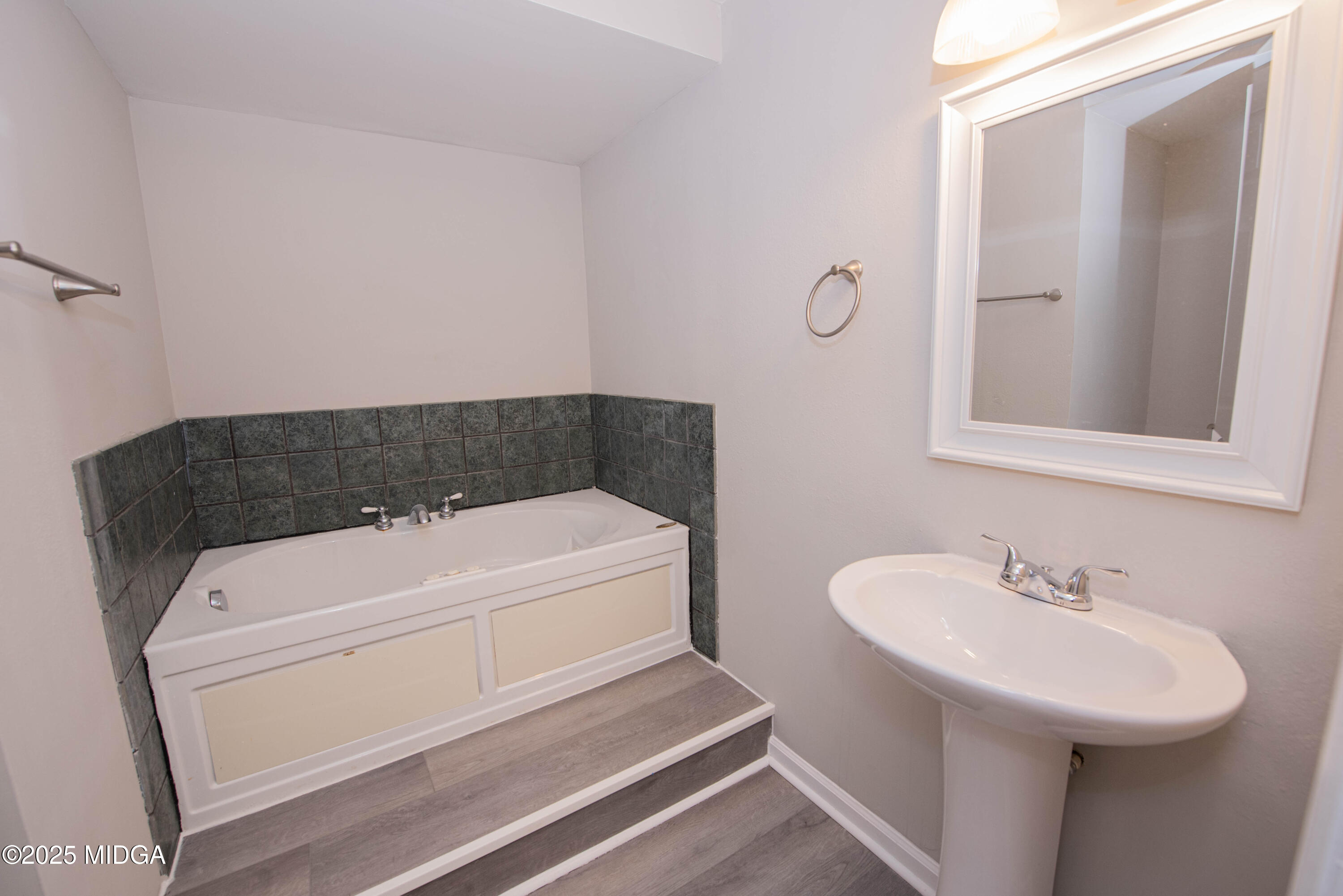 9 Friar Tuck Road Reynolds, GA 31076 - Photo 42 of 48 a bathroom with a sink and a mirror