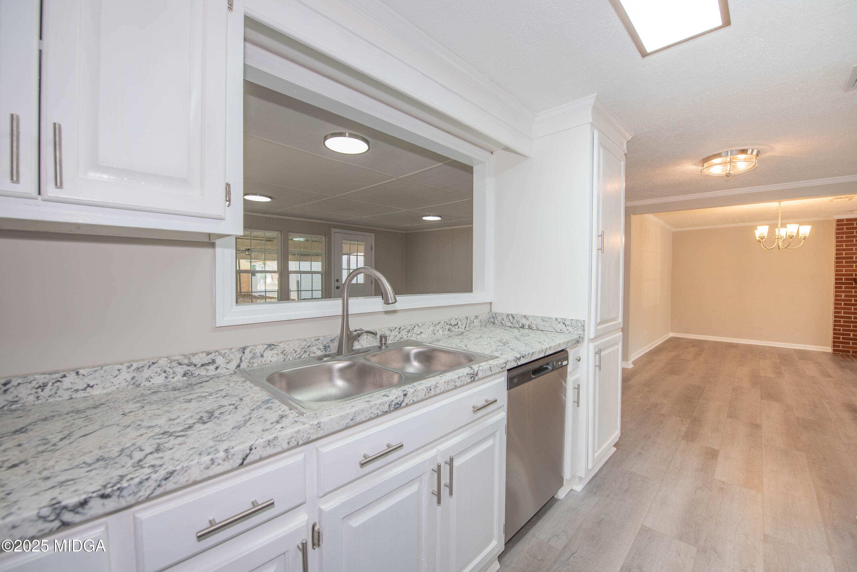 9 Friar Tuck Road Reynolds, GA 31076 - Photo 45 of 48 a bathroom with a granite countertop sink and a mirror