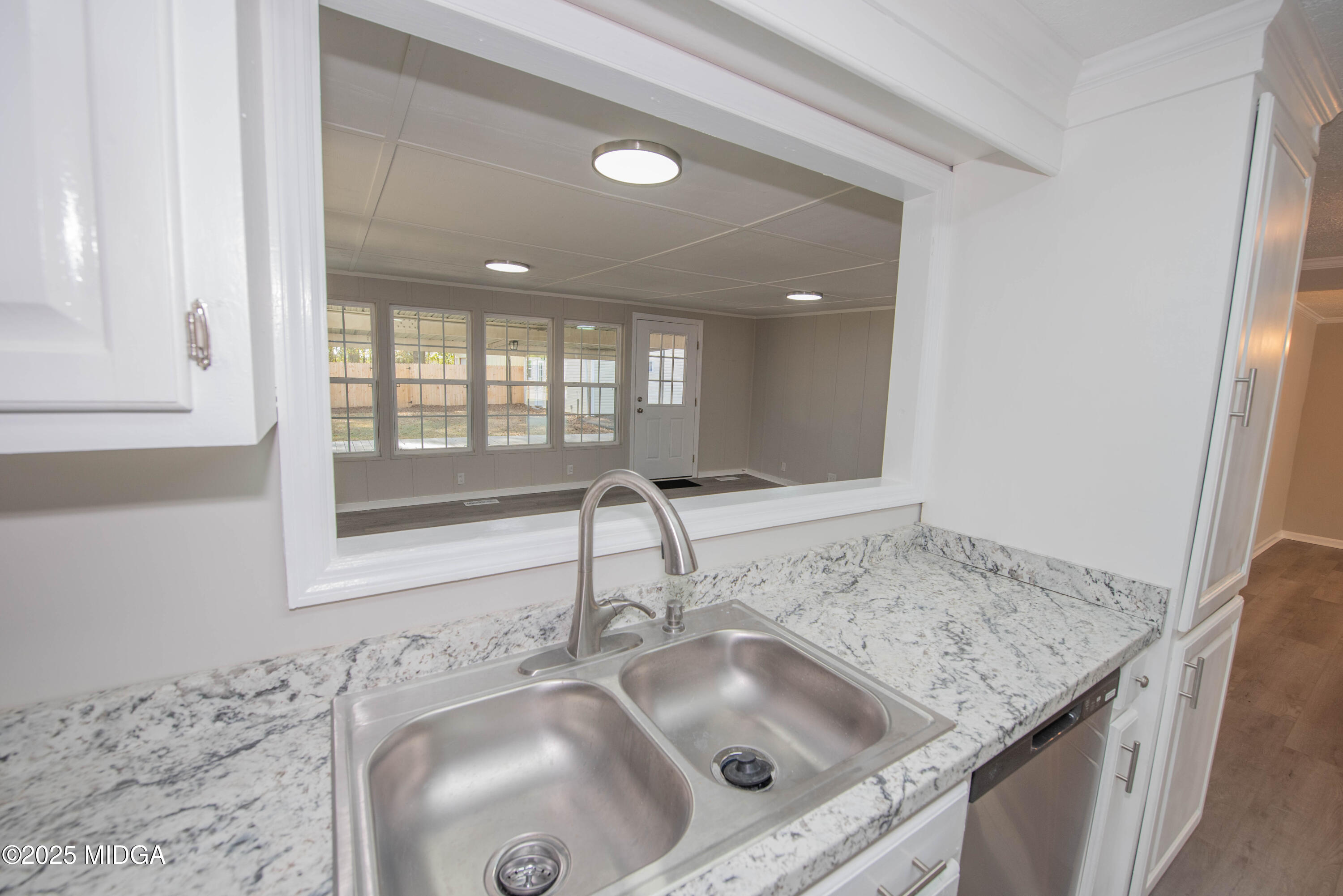 9 Friar Tuck Road Reynolds, GA 31076 - Photo 46 of 48 a kitchen with a sink and a window