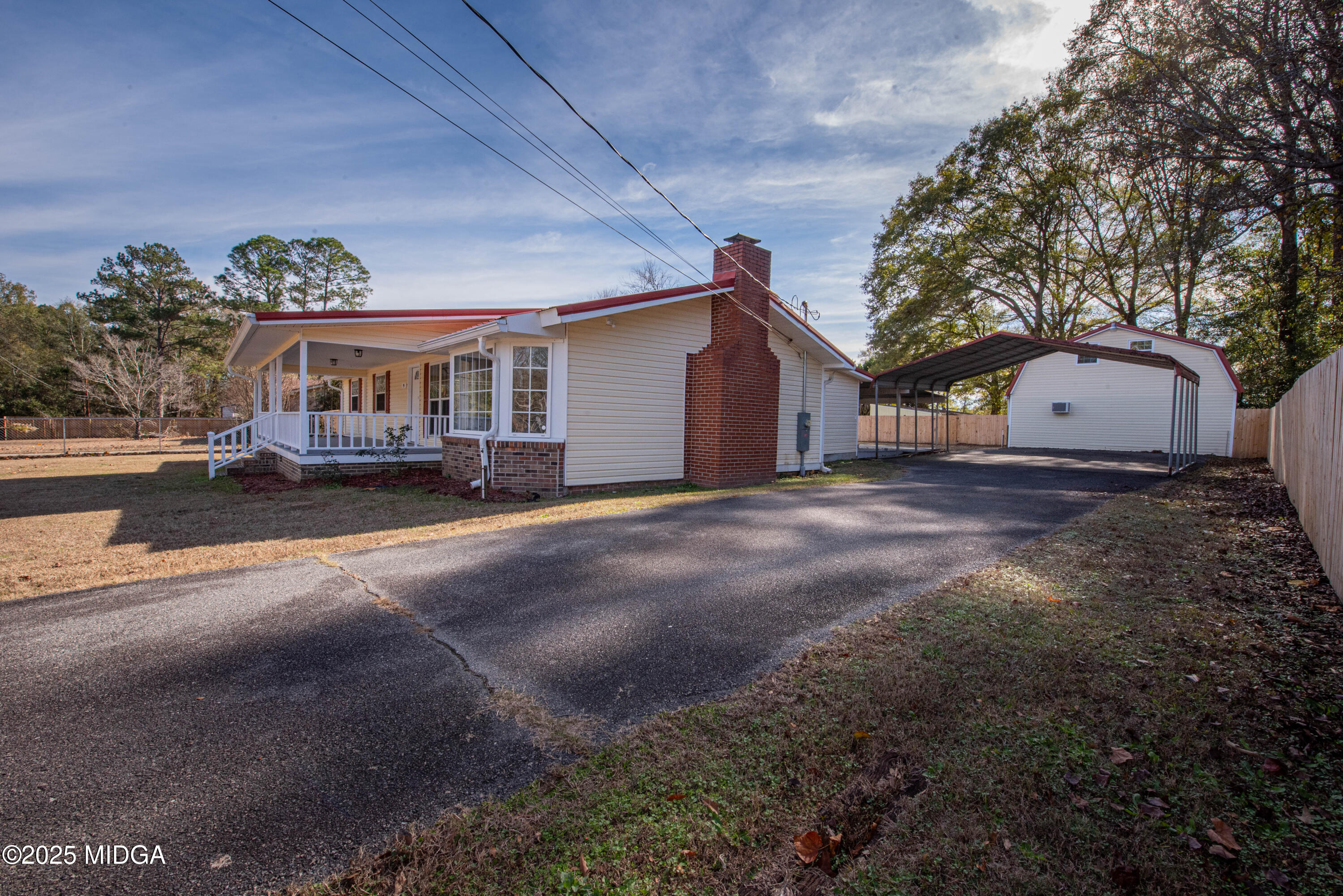 9 Friar Tuck Road Reynolds, GA 31076 - Photo 48 of 48 a view of a house with a yard