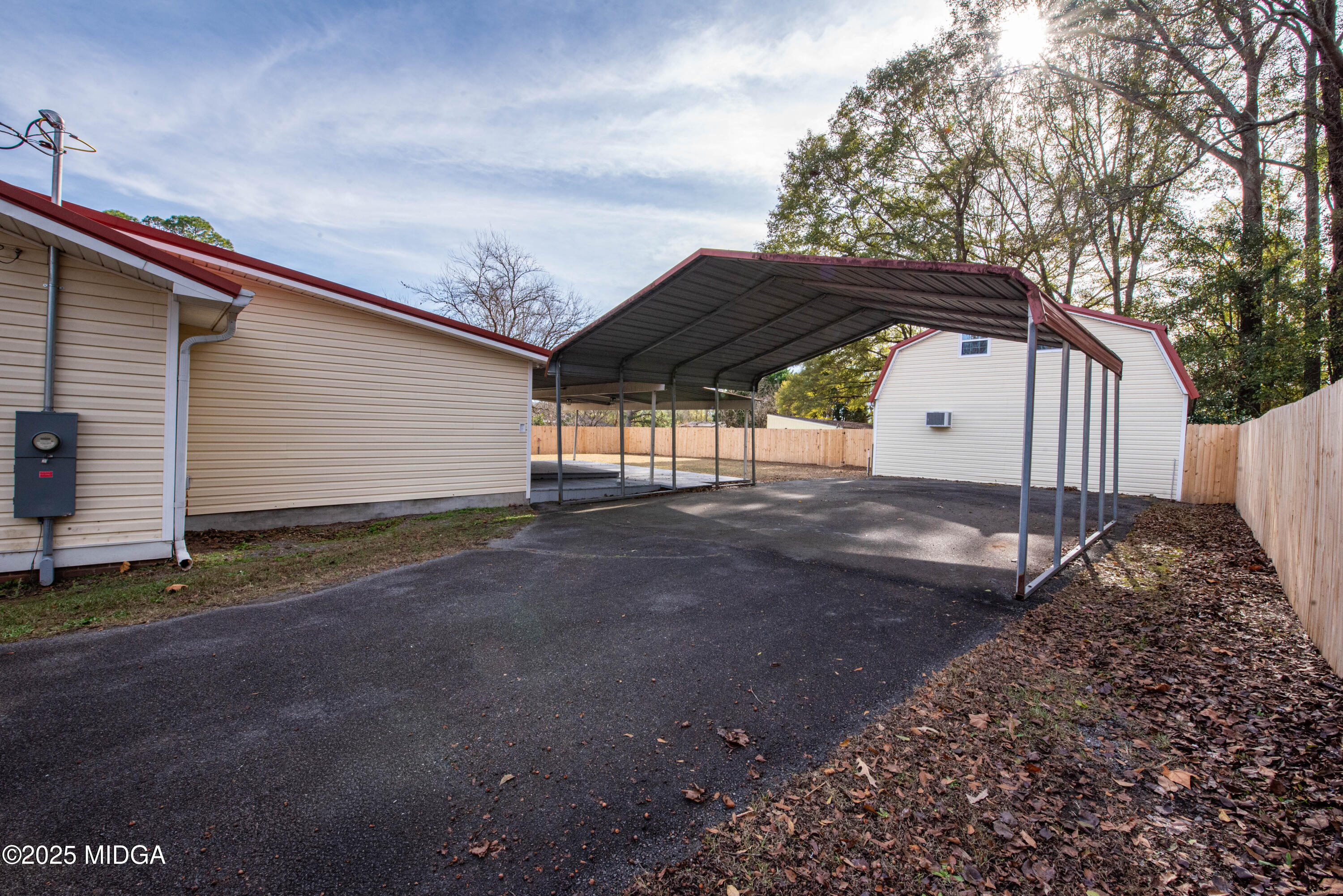 9 Friar Tuck Road Reynolds, GA 31076 - Photo 6 of 48 a view of backyard with a barn and large trees