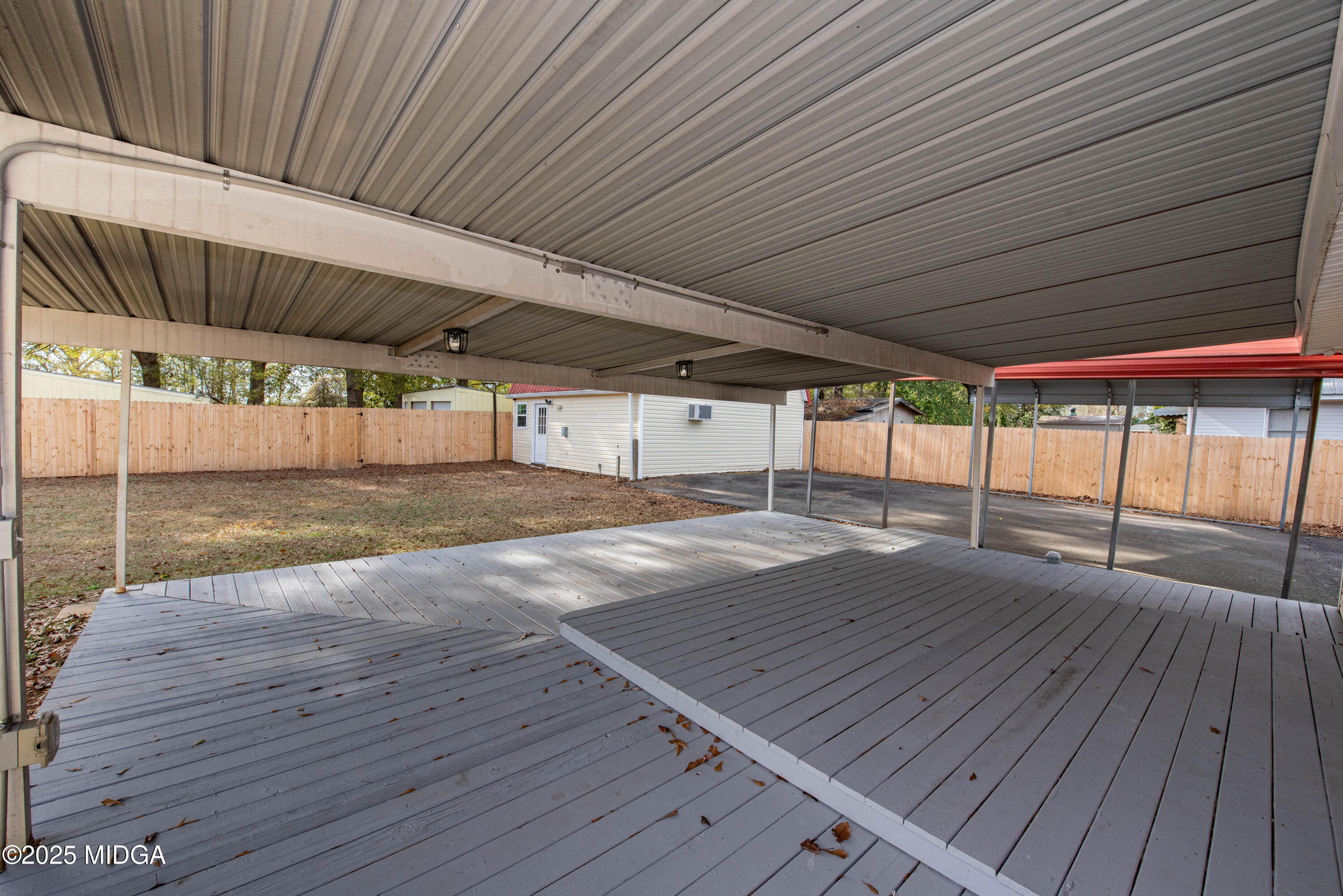 9 Friar Tuck Road Reynolds, GA 31076 - Photo 9 of 48 a view of empty room with wooden floor