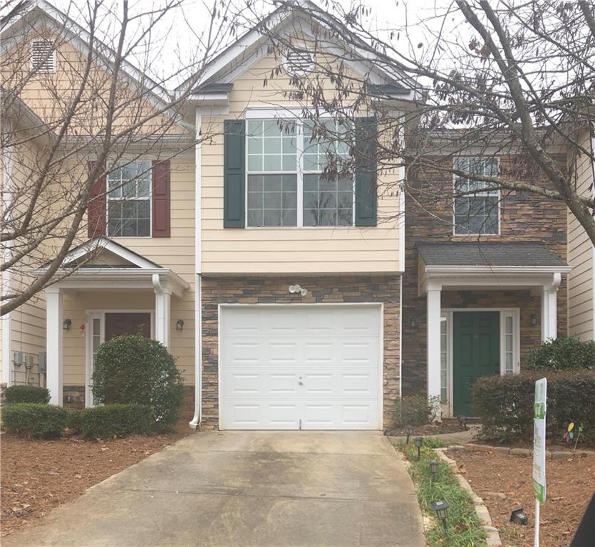 3734 Harvest Drive Decatur, GA 30034 - Photo 1 of 1 Home with stone exterior with garage.