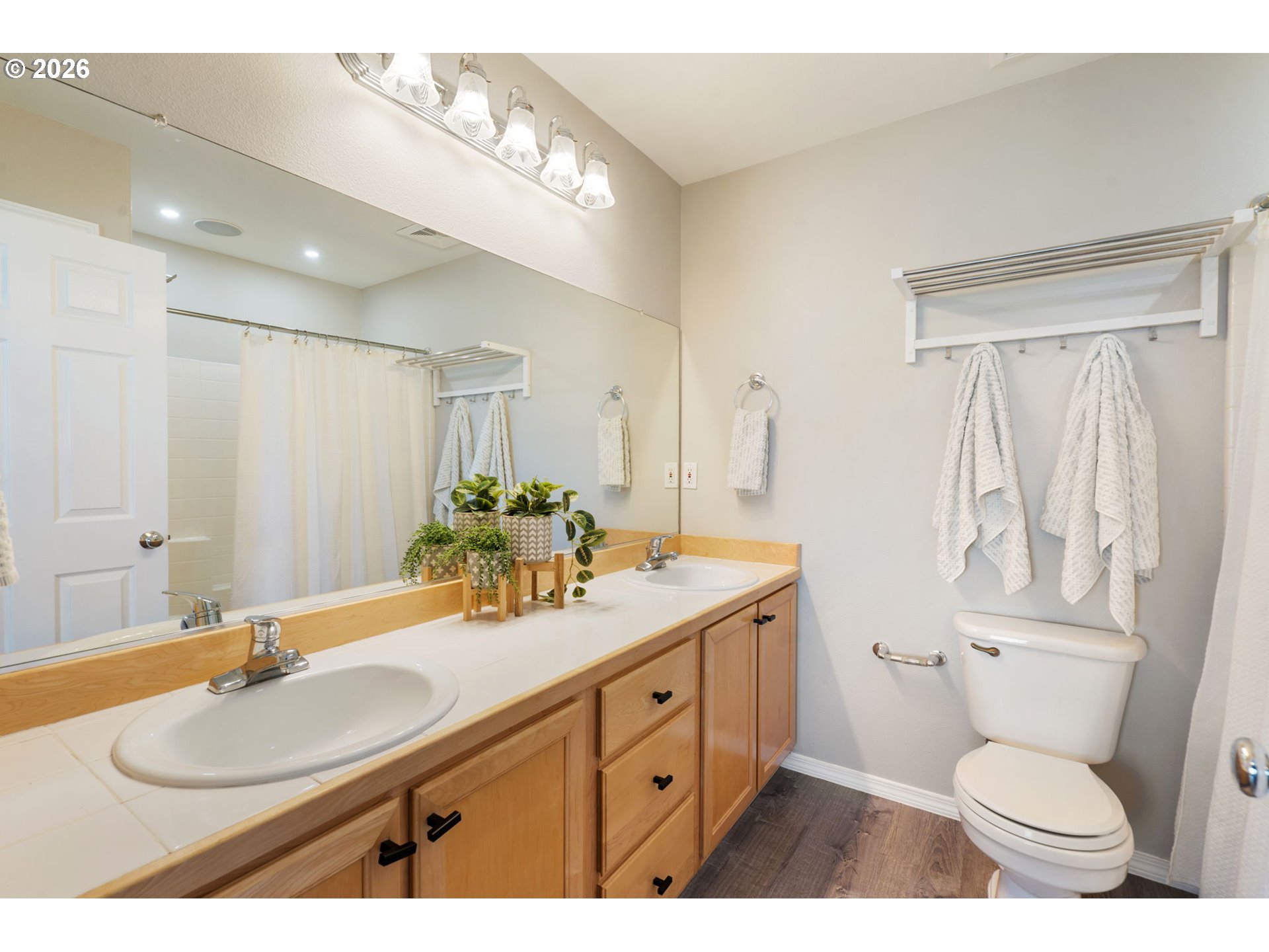 13159 Southwest Brianne Way Portland, OR 97223 - Photo 18 of 32 a bathroom with a sink toilet a mirror and shower