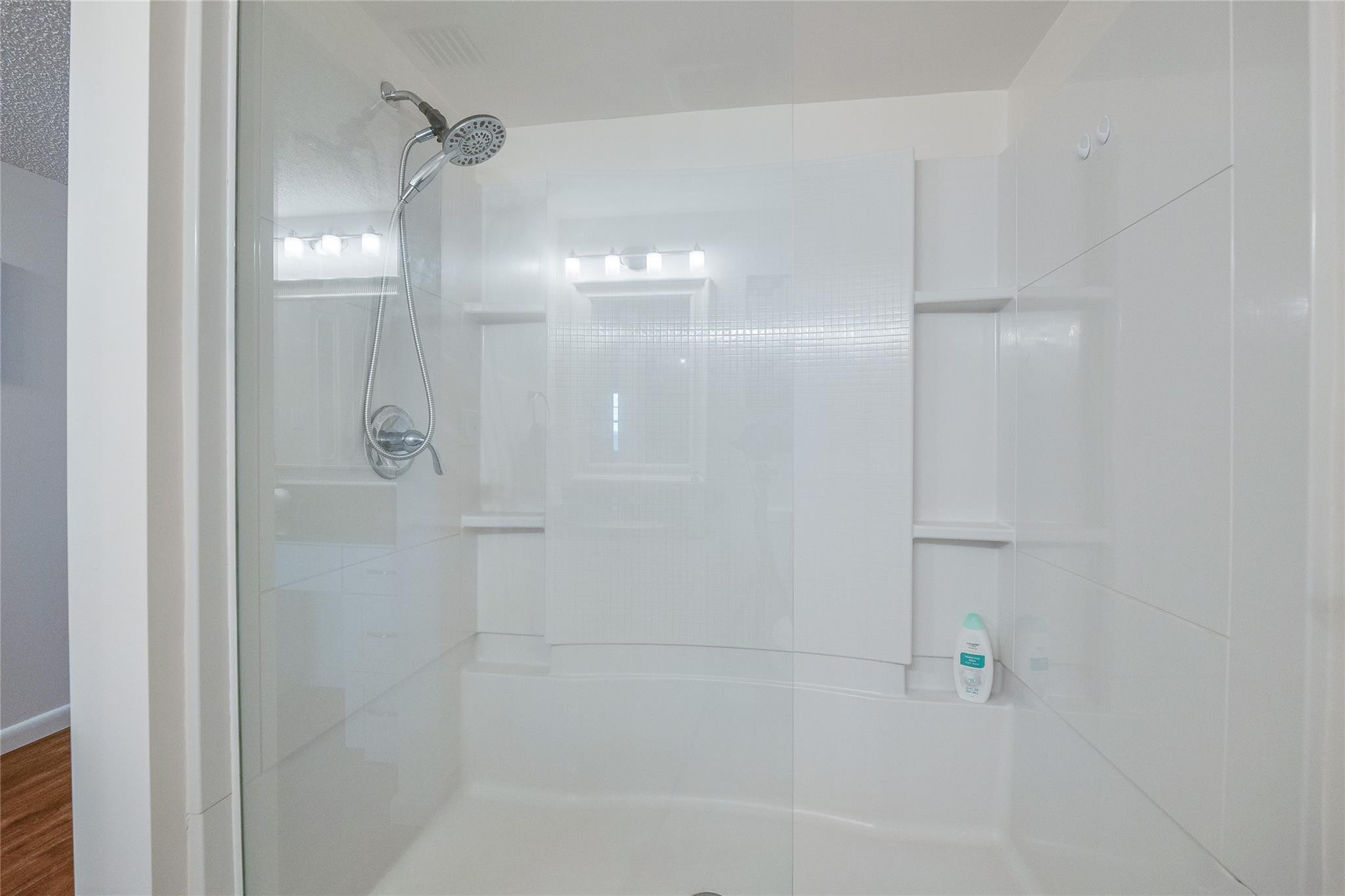 3930 Inverrary Boulevard, Unit 703D Lauderhill, FL 33319 - Photo 33 of 72 a bathroom with a shower