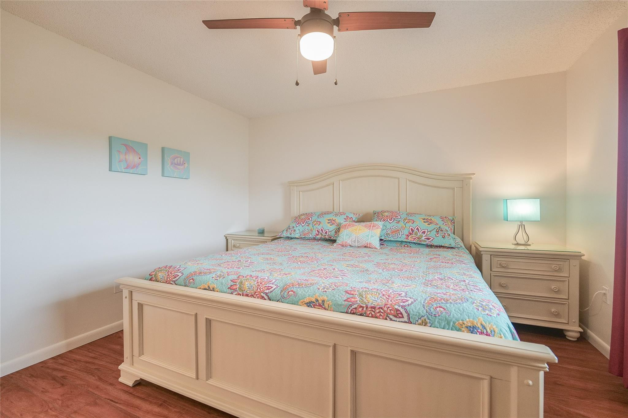 3930 Inverrary Boulevard, Unit 703D Lauderhill, FL 33319 - Photo 35 of 72 a bedroom with a bed and a dresser