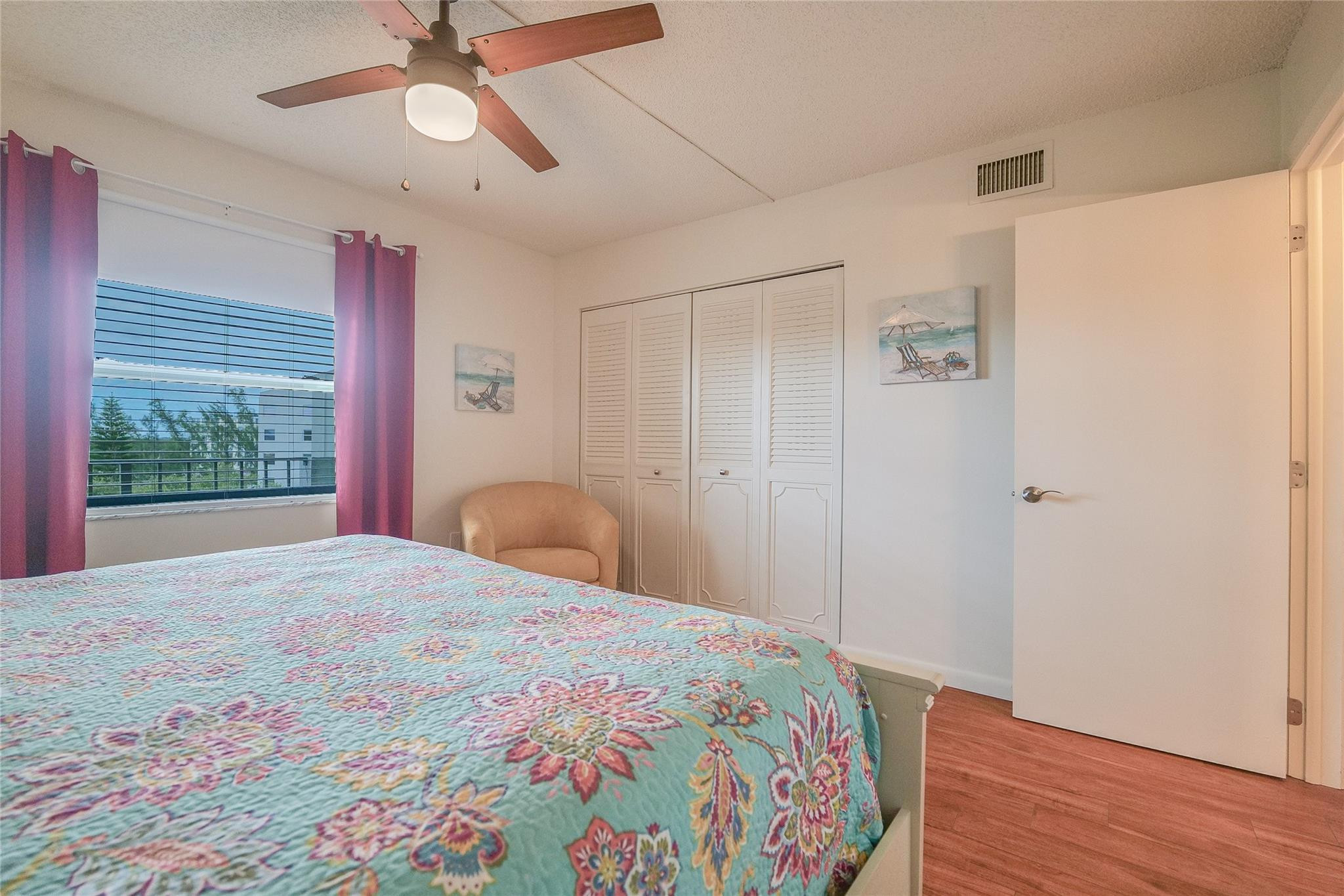 3930 Inverrary Boulevard, Unit 703D Lauderhill, FL 33319 - Photo 37 of 72 a bedroom with a bed and a window