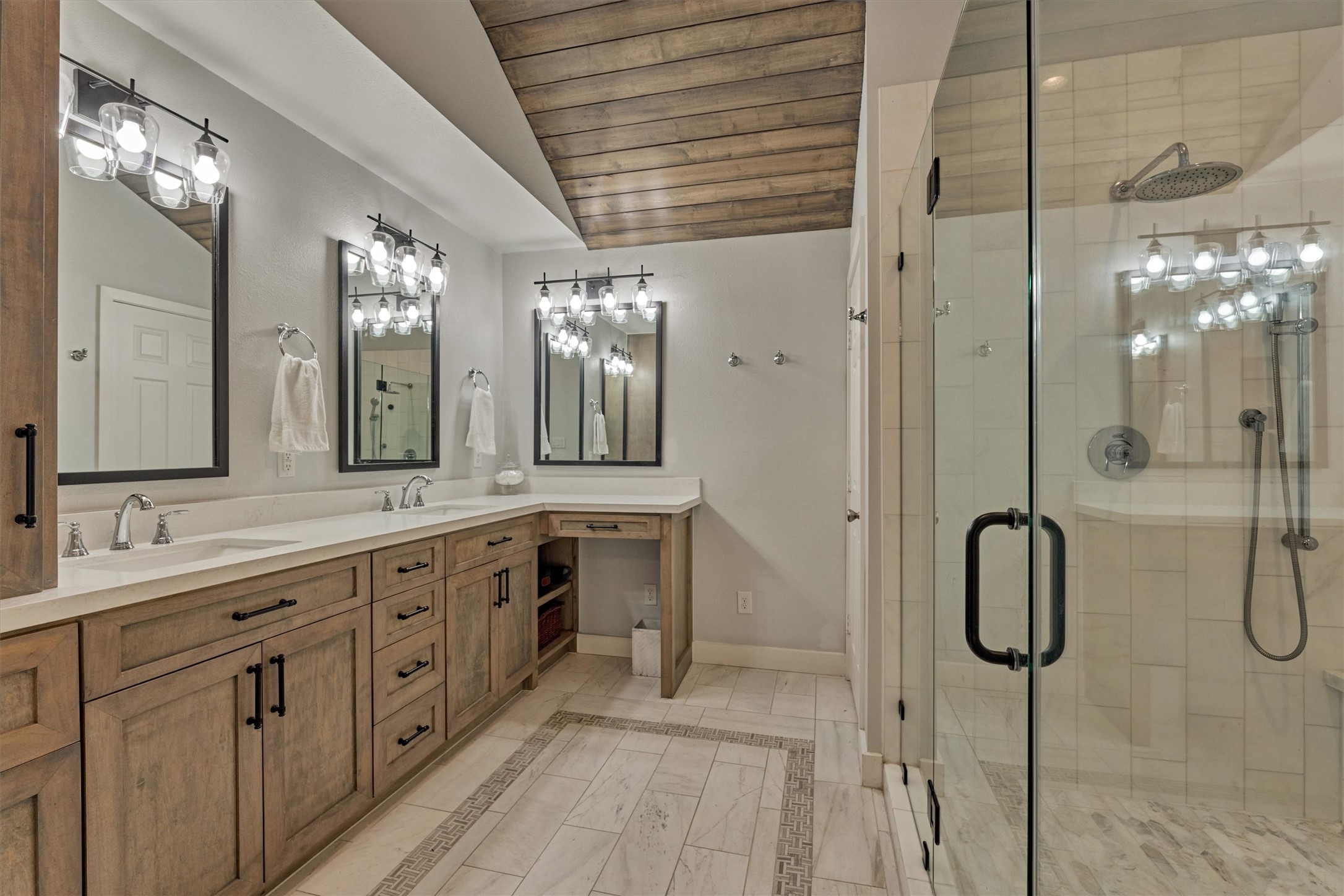 6515 Glenhill Drive Spring, TX 77389 - Photo 18 of 39 a bathroom with a double vanity sink shower and a mirror