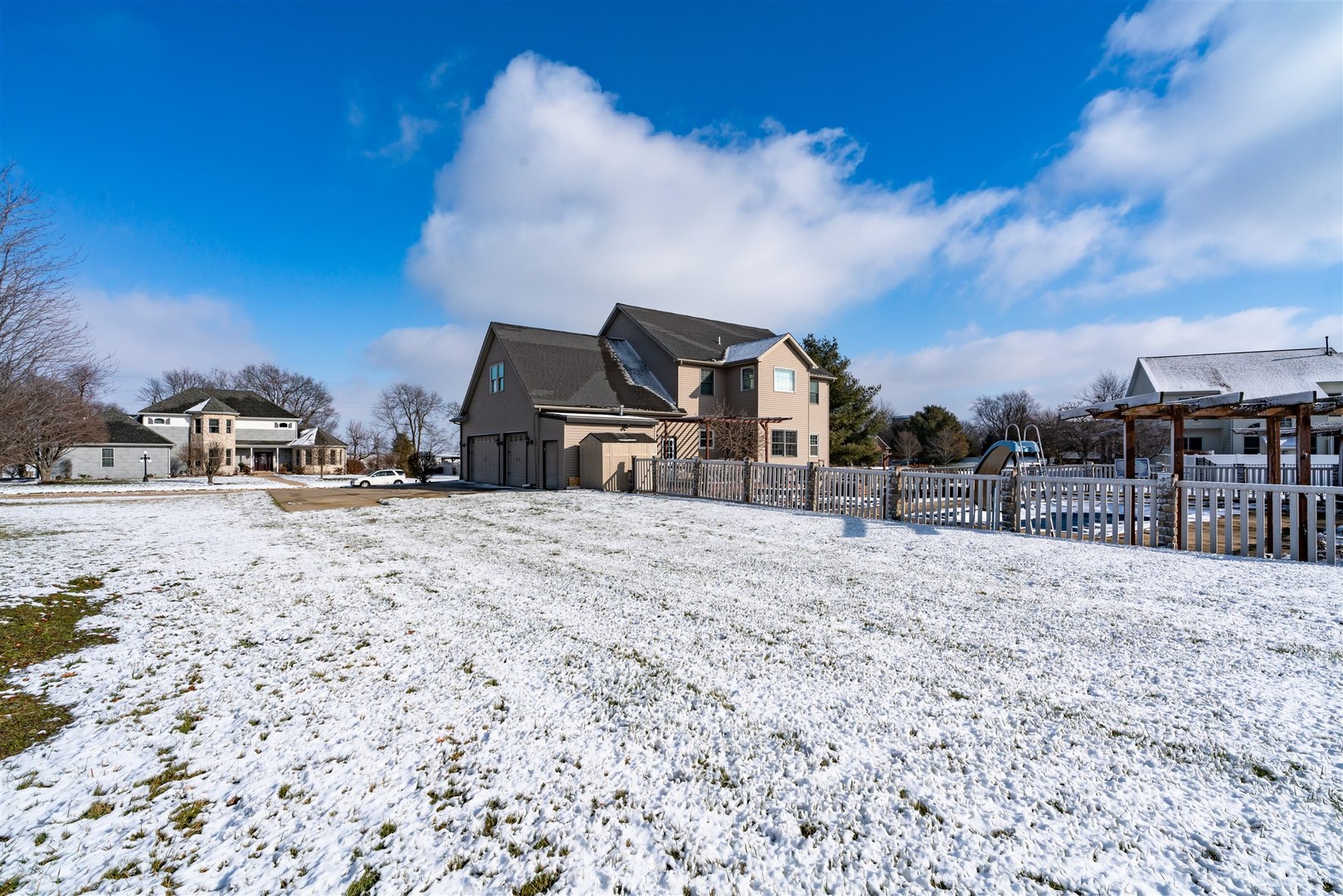 4 Cloverhill Circle Bloomington, IL 61705 - Photo 12 of 63 a view of houses with snow on the road