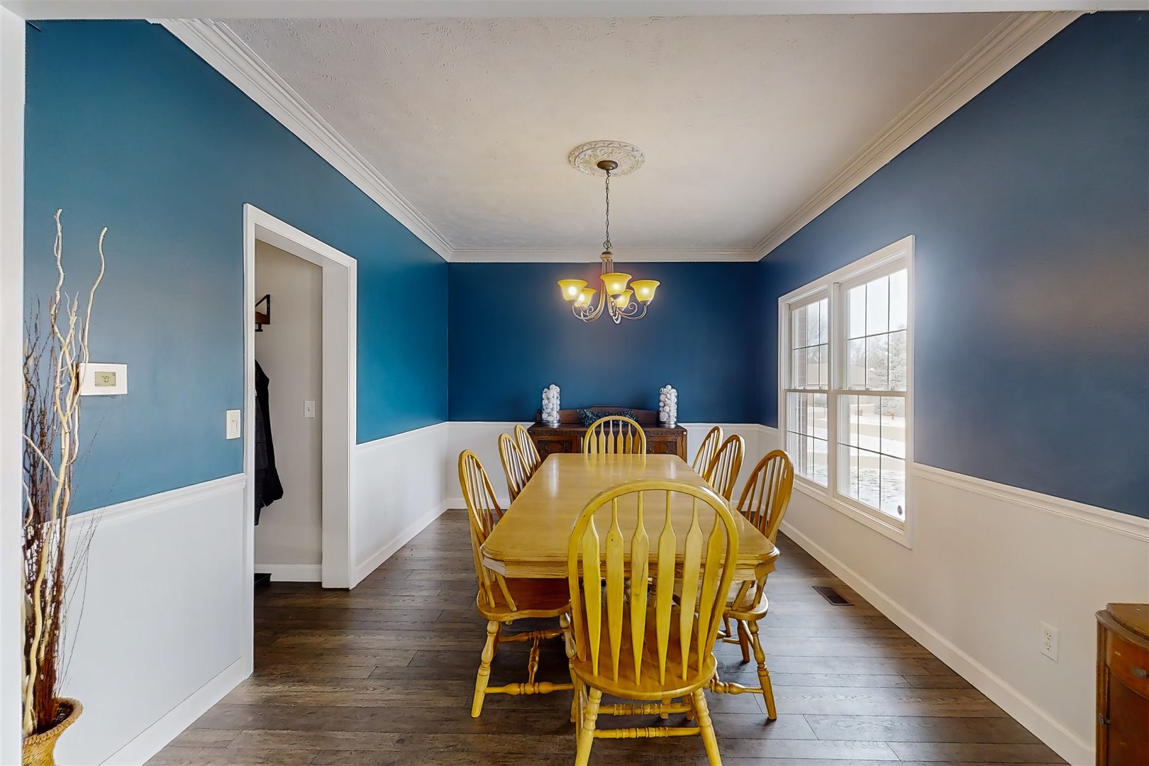 4 Cloverhill Circle Bloomington, IL 61705 - Photo 20 of 63 a view of a dining room with furniture wooden floor and chandelier