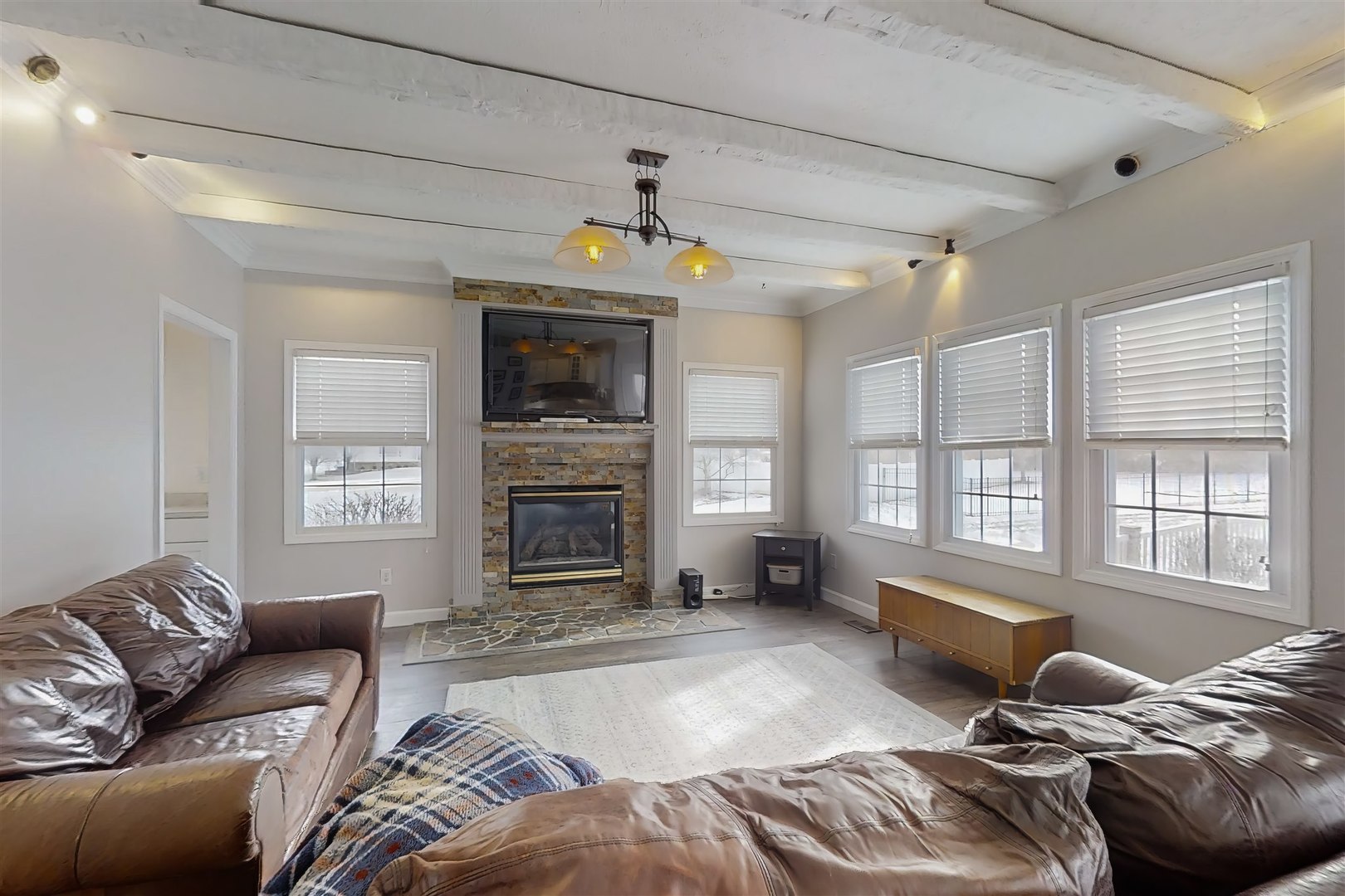 4 Cloverhill Circle Bloomington, IL 61705 - Photo 25 of 63 a living room with furniture windows and a fireplace
