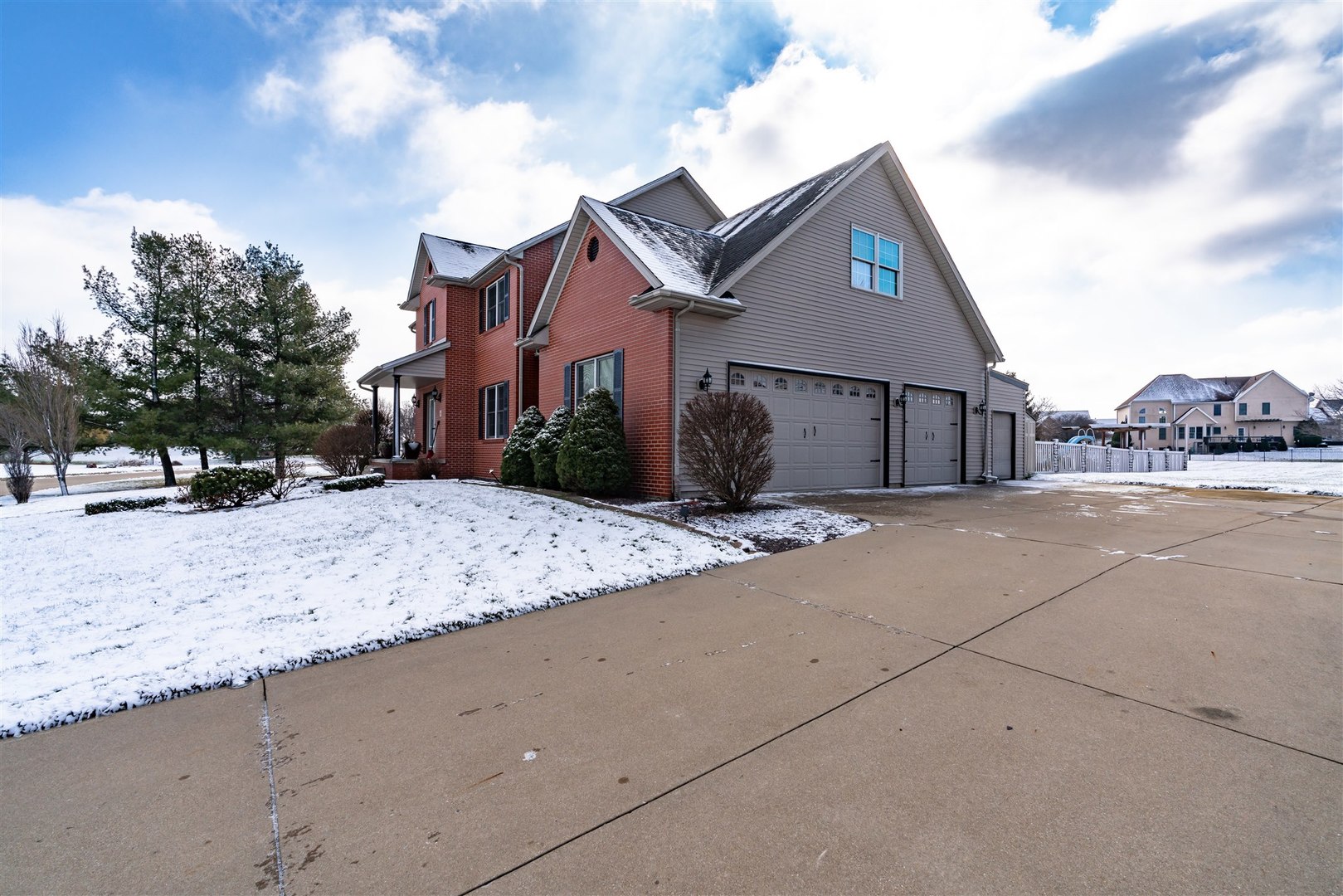 4 Cloverhill Circle Bloomington, IL 61705 - Photo 3 of 63 a front view of a house with a yard