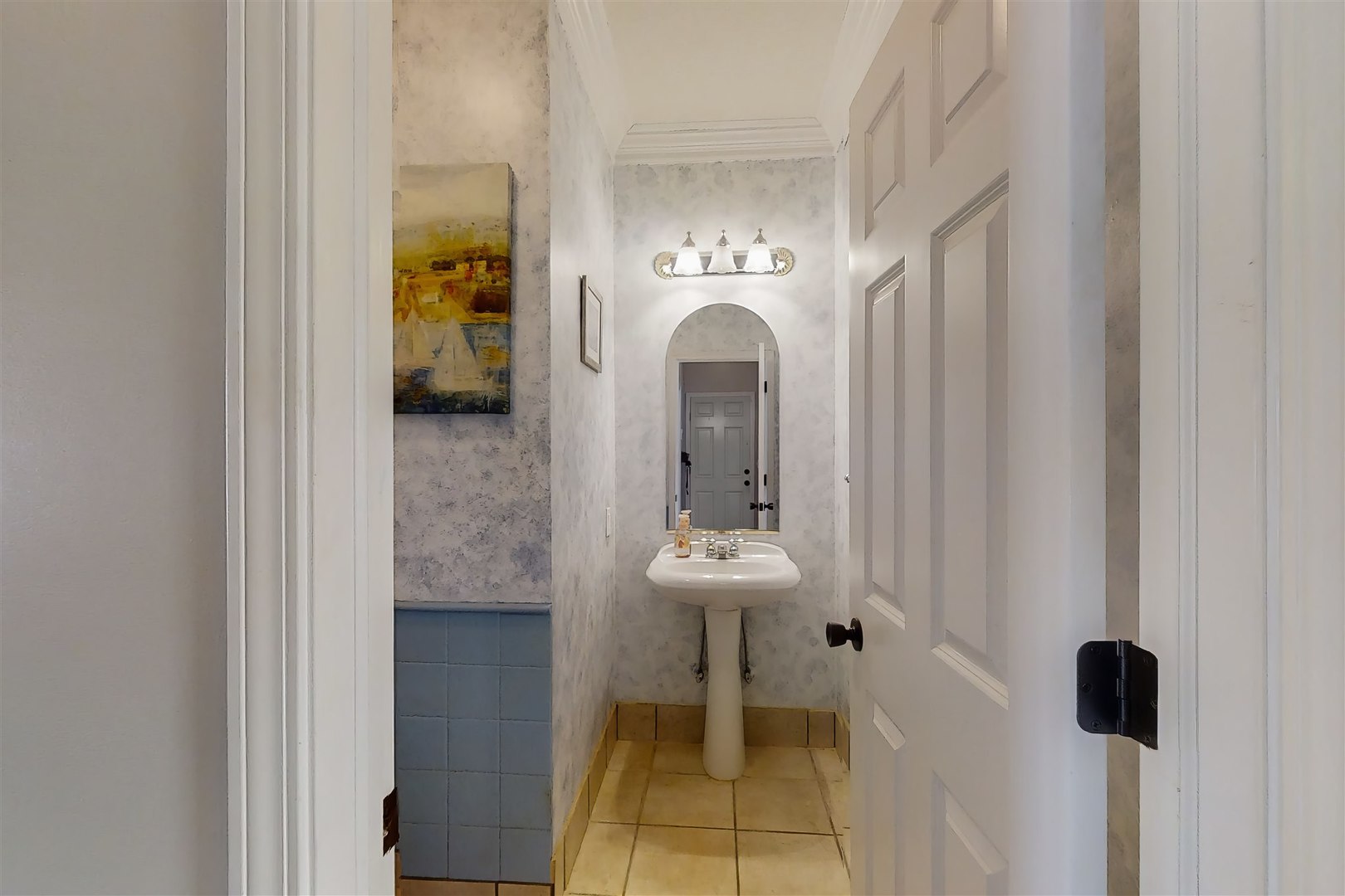 4 Cloverhill Circle Bloomington, IL 61705 - Photo 35 of 63 a view of a bathroom with a sink and a mirror